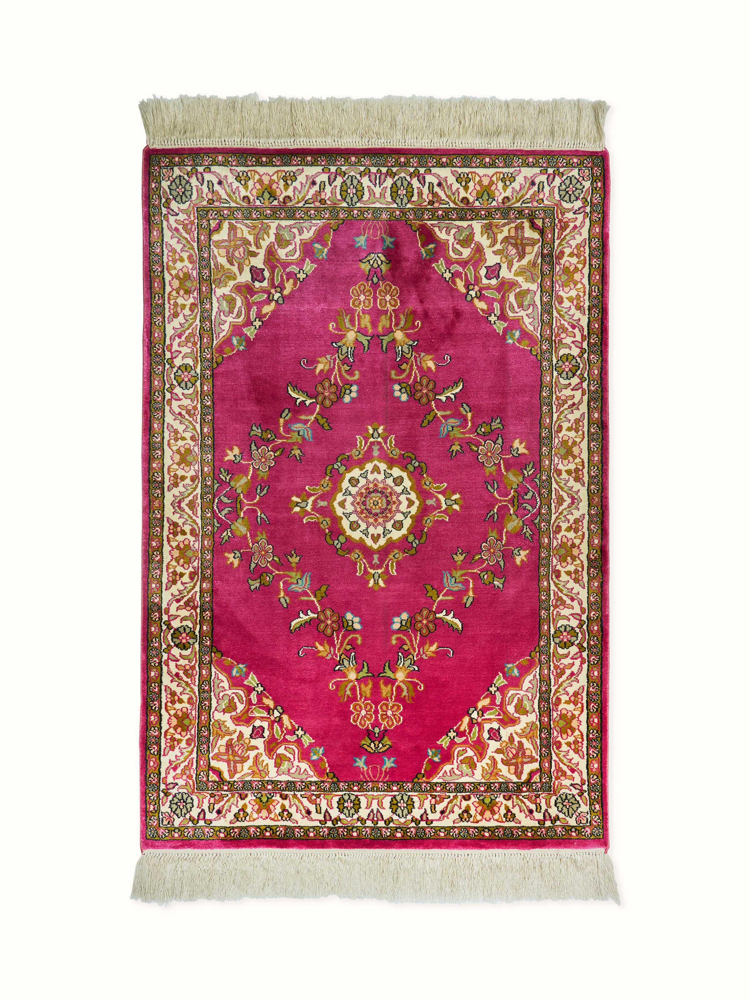Traditional pink silk carpet from Kashmir with ornate Opan motifs, finely hand-knotted – full view