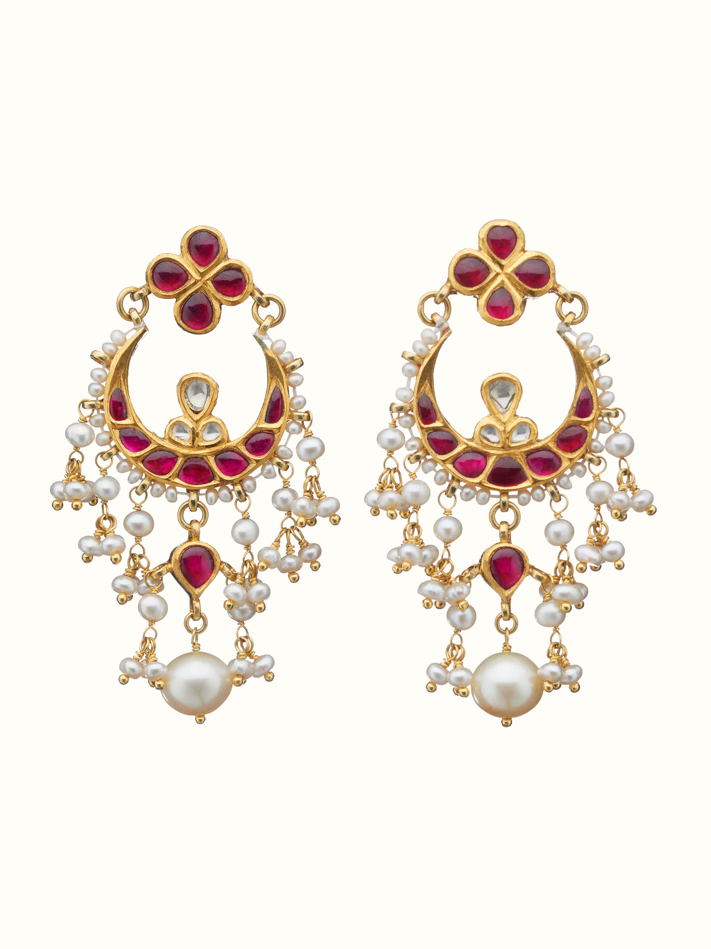 front view of jadau 18 karat gold drops with traditional craftsmanship