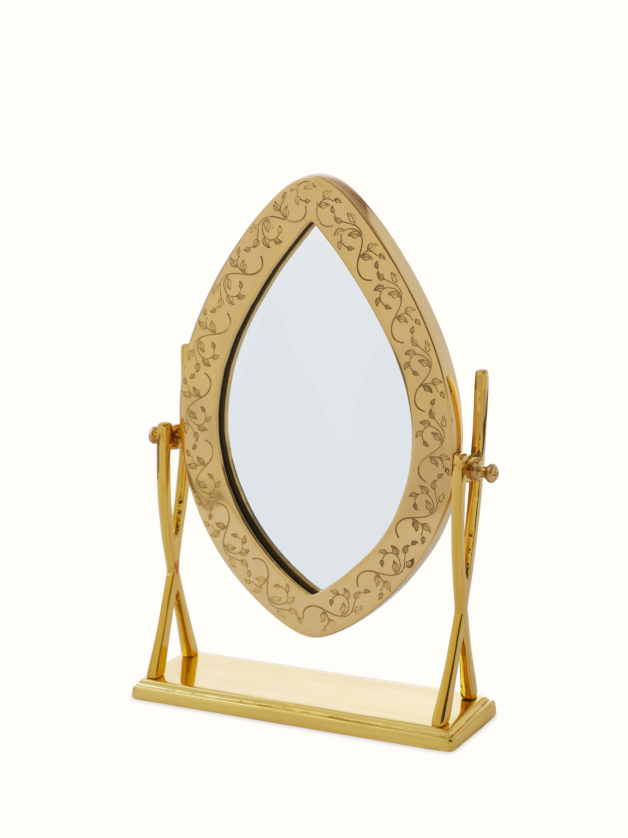 Close-up view of Natural Brass Table Mirror from Swadesh, highlighting the detailed craftsmanship and smooth reflective surface.