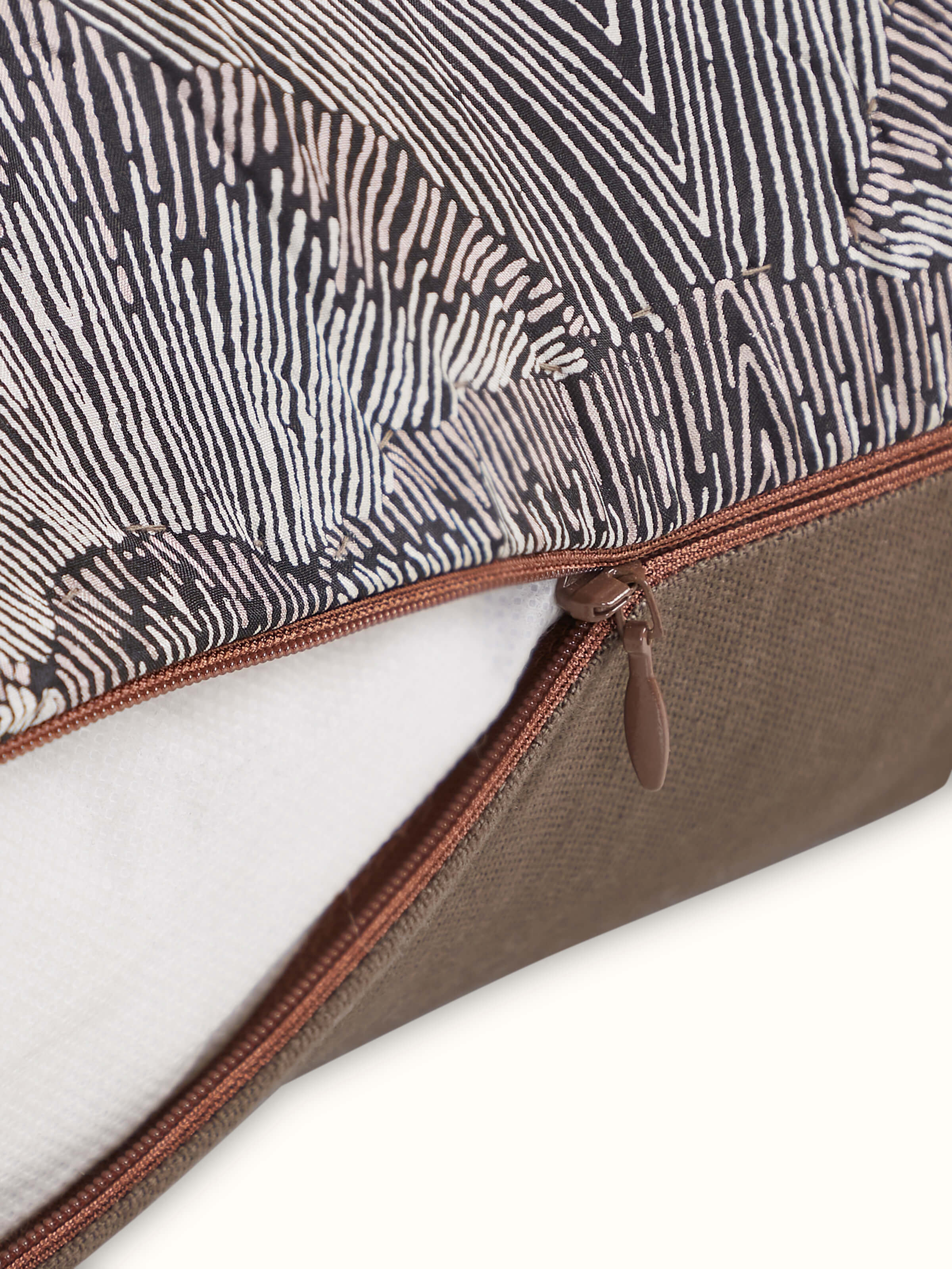 Fine detailing of Sanganeri print on brown silk Parvat cushion cover