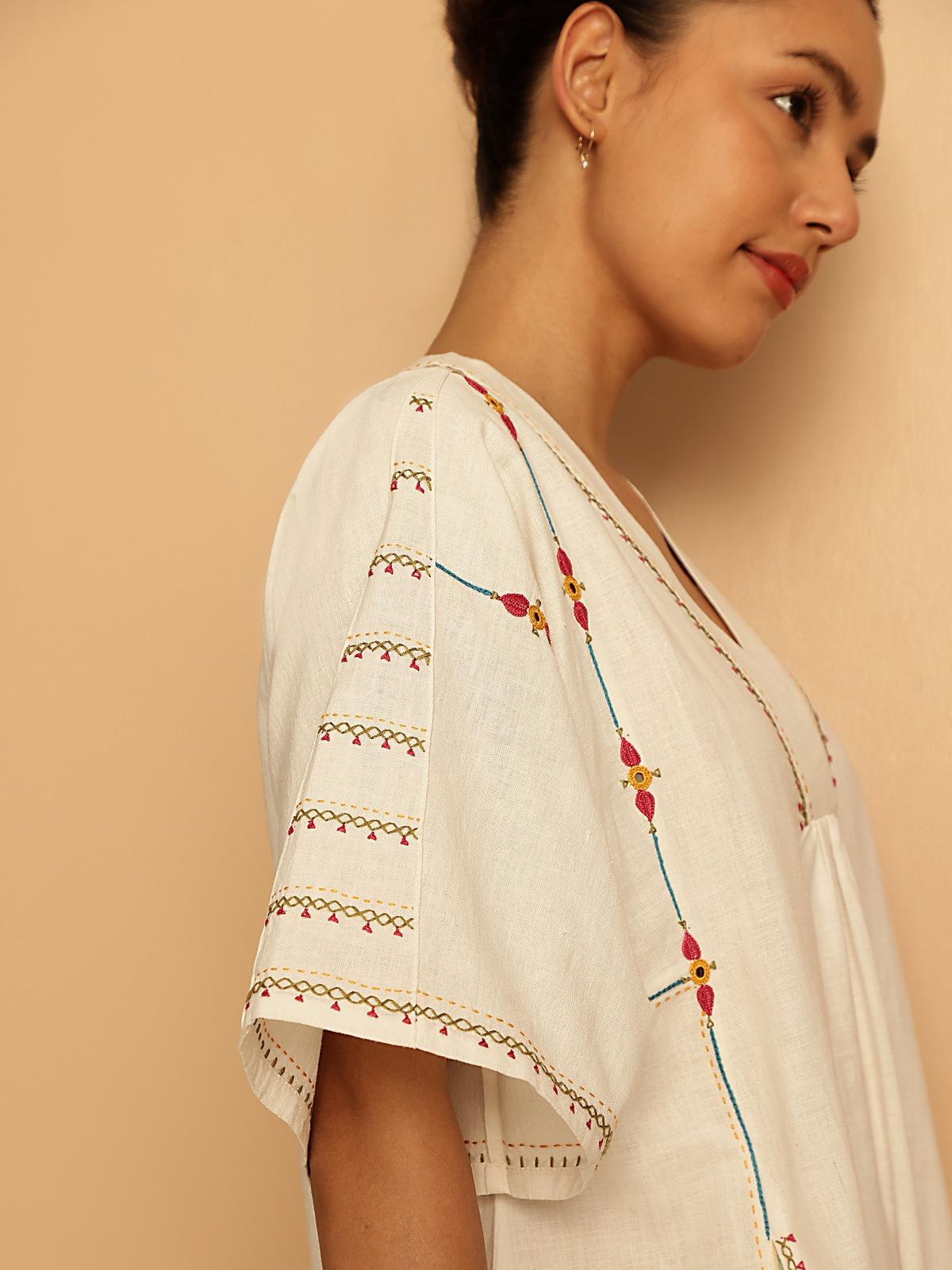 Side profile shot showing the relaxed fit and flowing style.