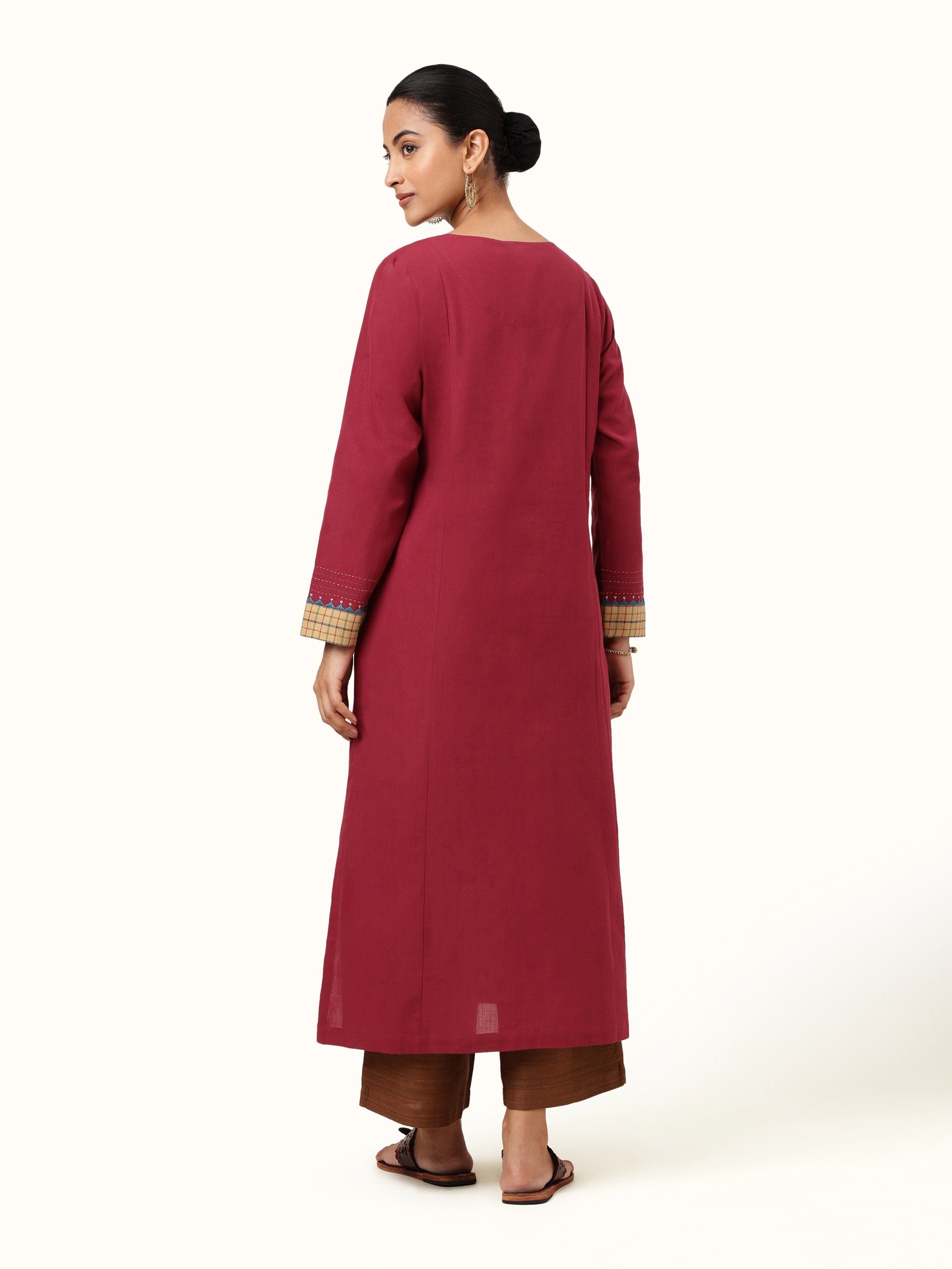 Back view completing the kurta’s elegant presentation.