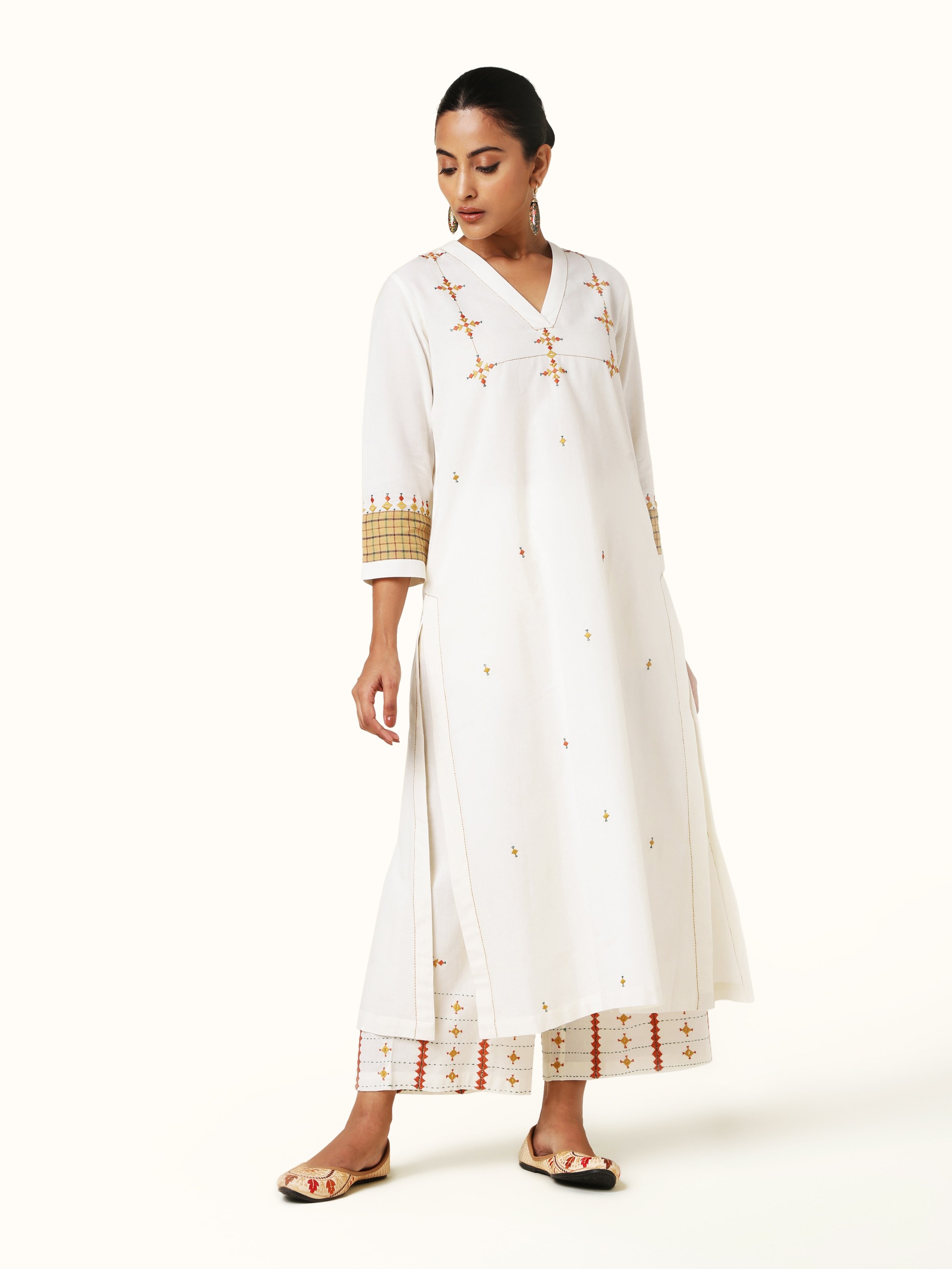 Front view of Off-white Cotton Rajasthan Embroidery Long Kurta showcasing intricate hand embroidery.