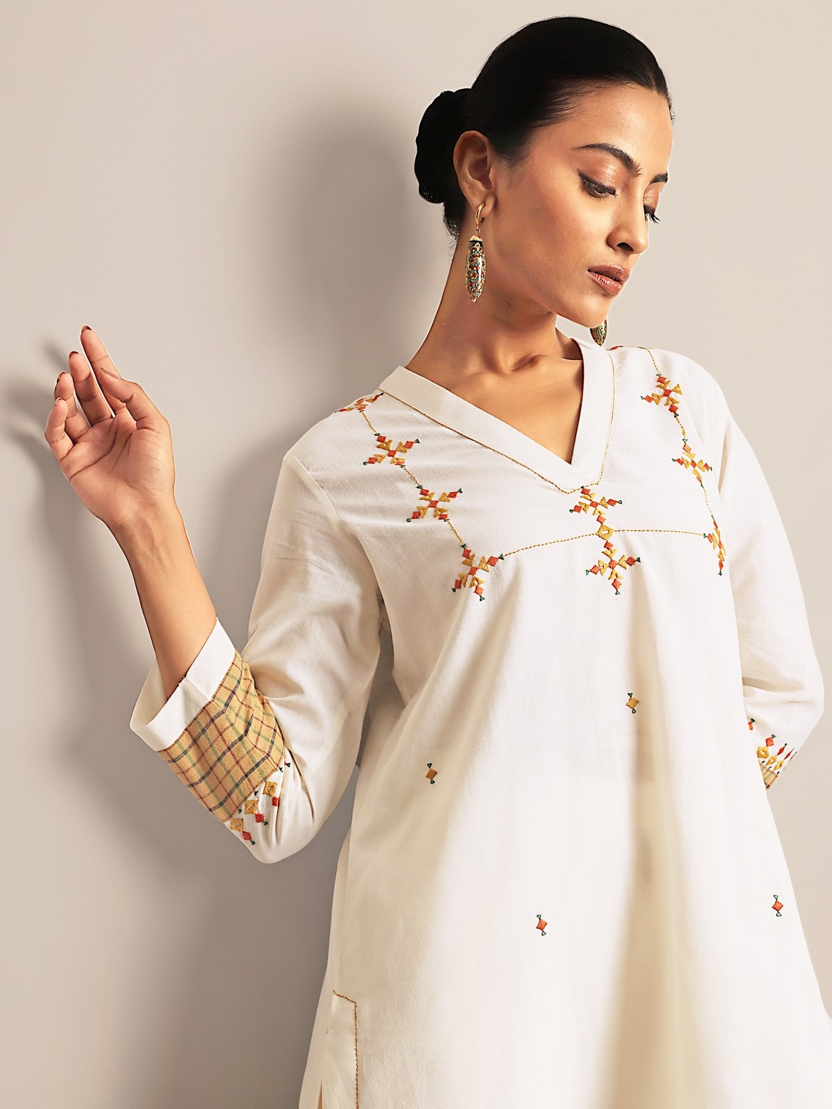 Close-up detail of hand embroidery on Off-white Cotton Rajasthan Long Kurta.