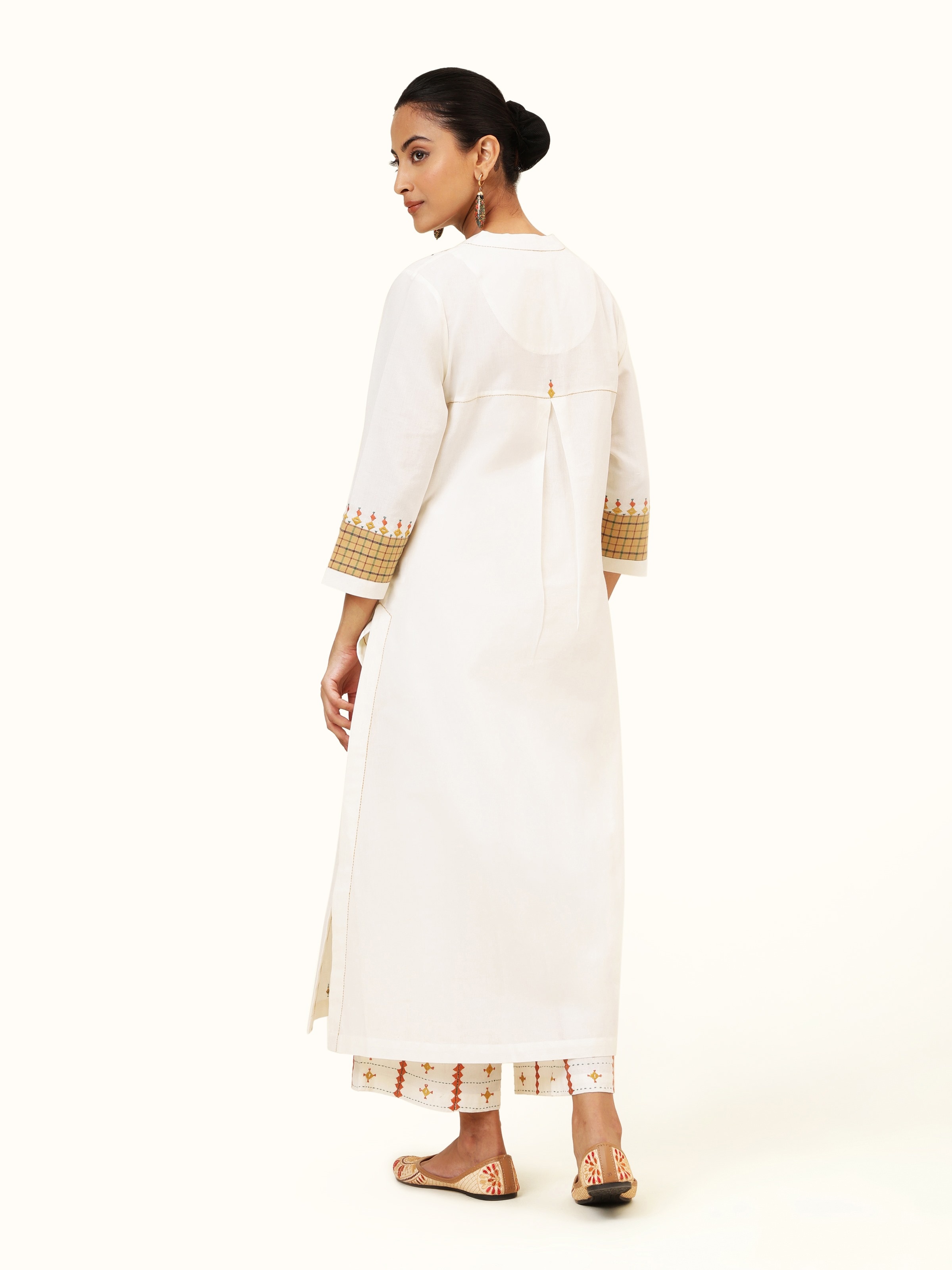 Back view of Off-white Cotton Rajasthan Embroidery Long Kurta showing embroidery continuation.