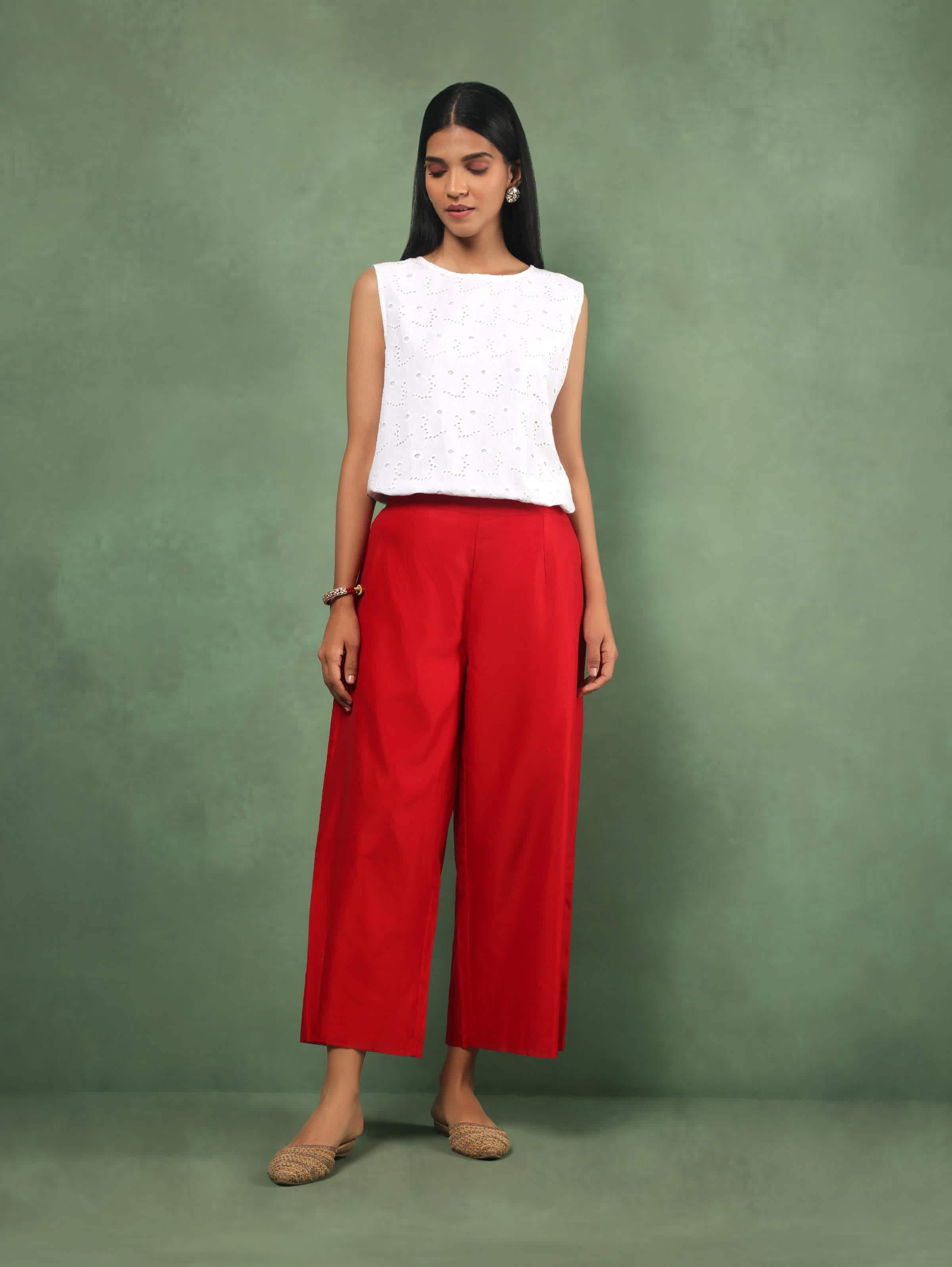 Lifestyle view of red Chanderi palazzo paired with kurta for a festive ethnic outfit