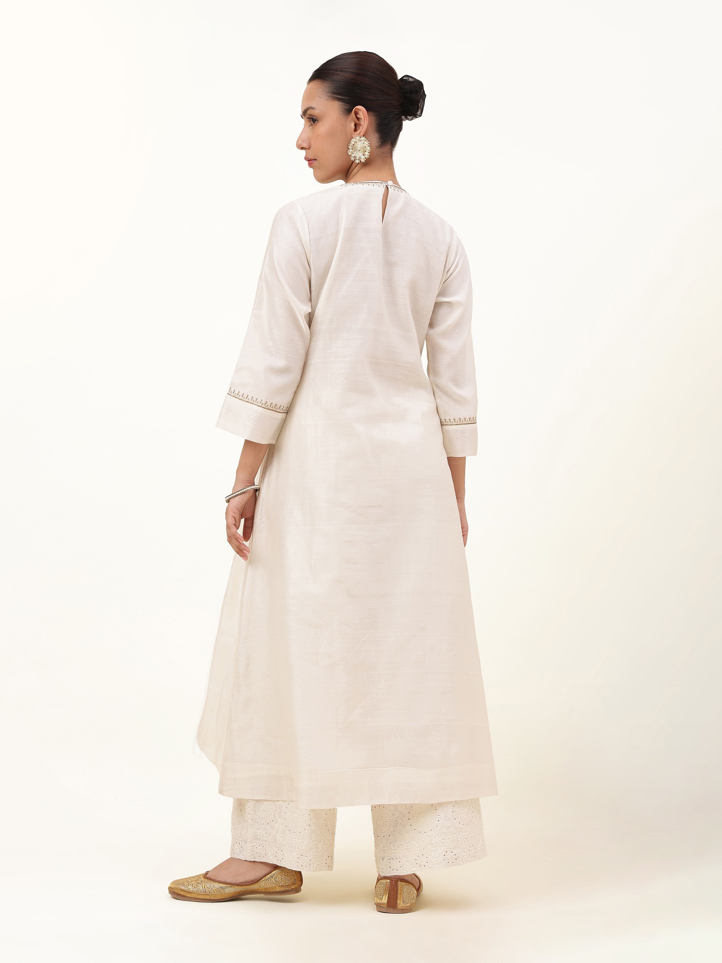 Back view of Off-white A-Line Angrakha Kurta in Chanderi fabric, featuring a clean finish and soft sheen.