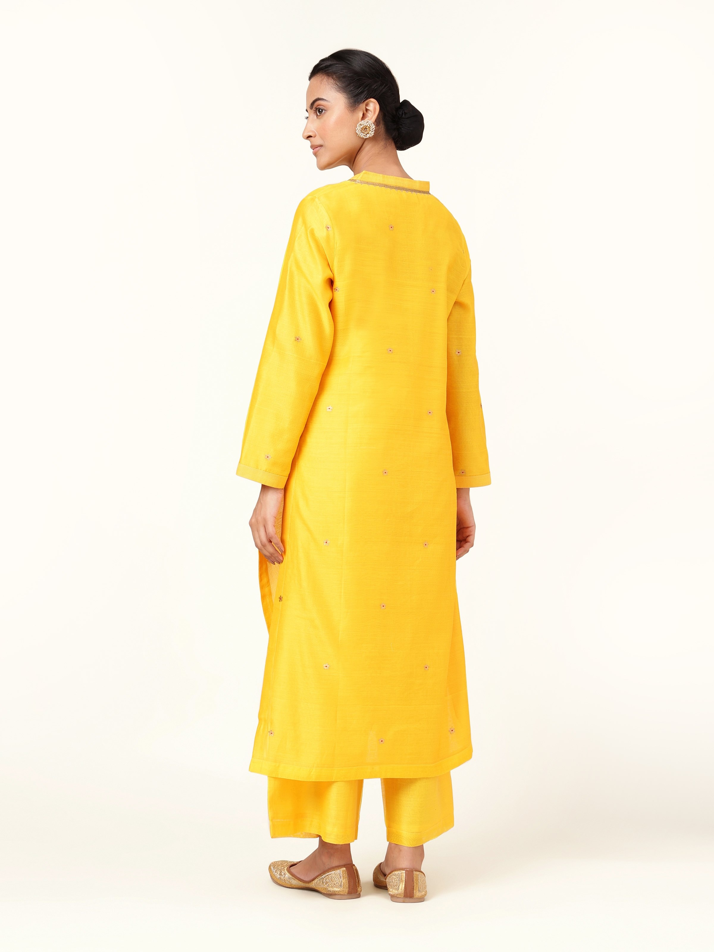 Back view of yellow cotton silk A-line kurta showcasing structured fit and Chanderi weave.