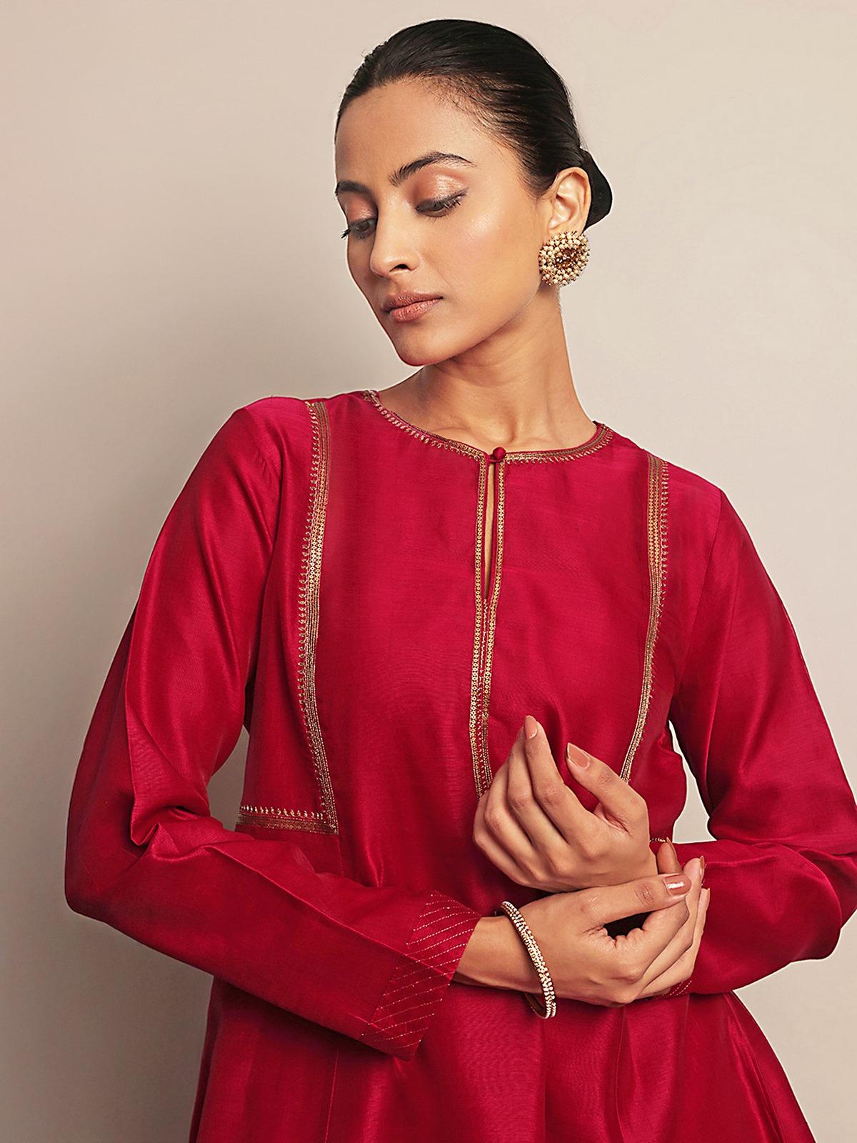 Angled view highlighting the kurta’s fall and handwoven texture