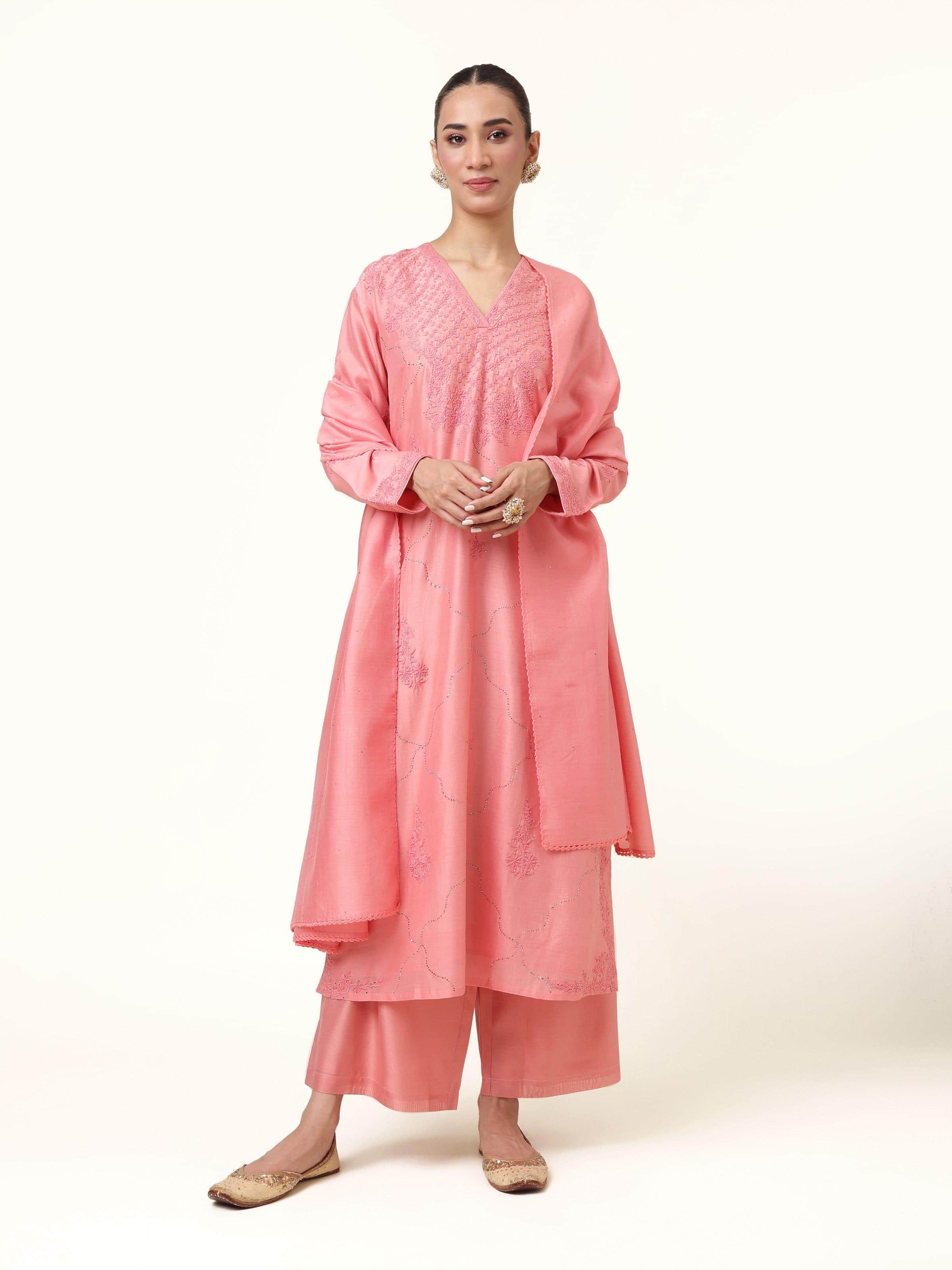 Front view of pink silk Chikankari kurta set (3 pcs) featuring delicate hand embroidery.