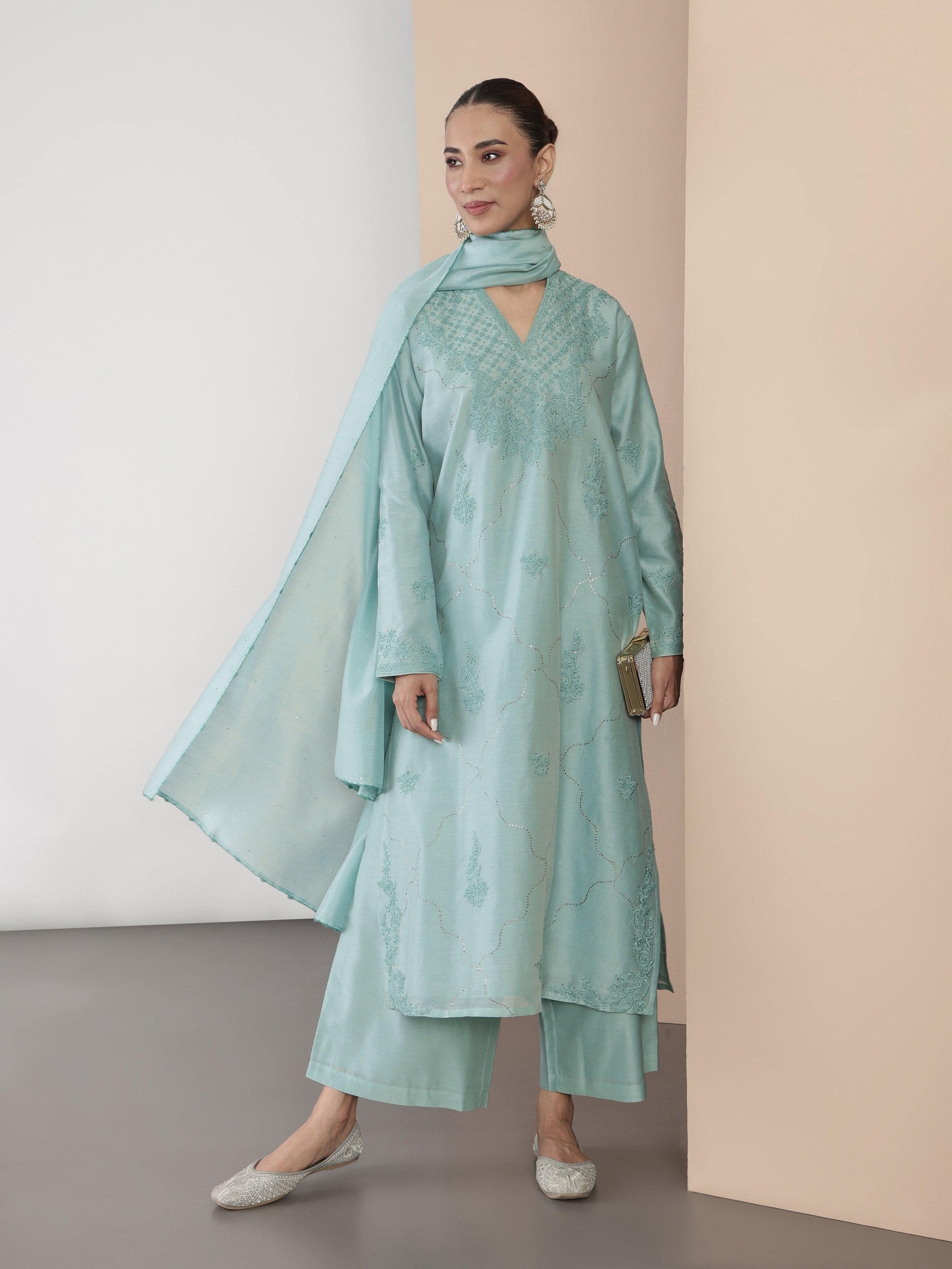 Lifestyle view showing the Chikankari kurta set styled with dupatta and pants.