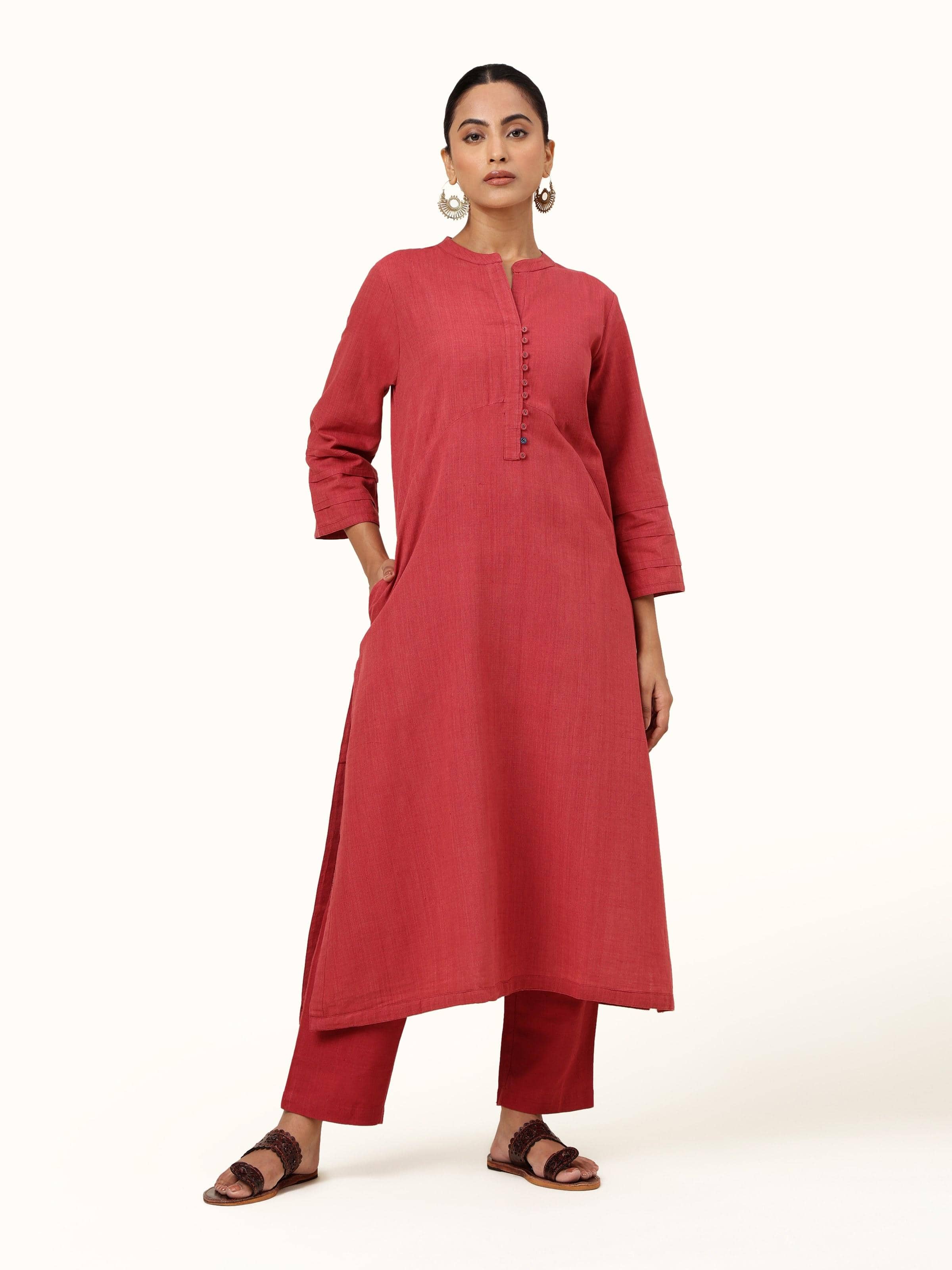 Front view of red cotton straight-cut pant showcasing structured fit and clean finish
