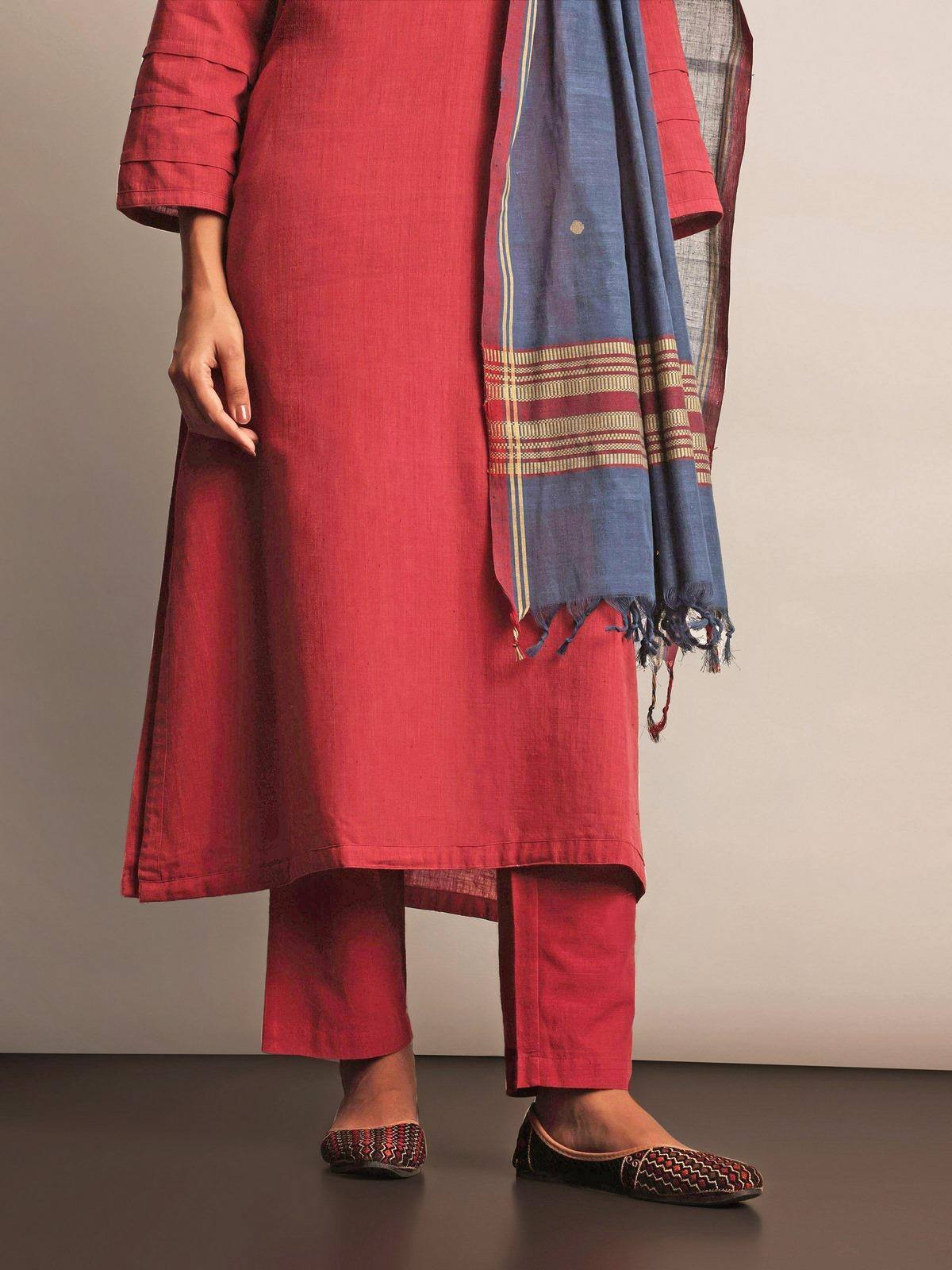 Alternate lifestyle view of red straight-cut cotton pant styled with a handloom kurta