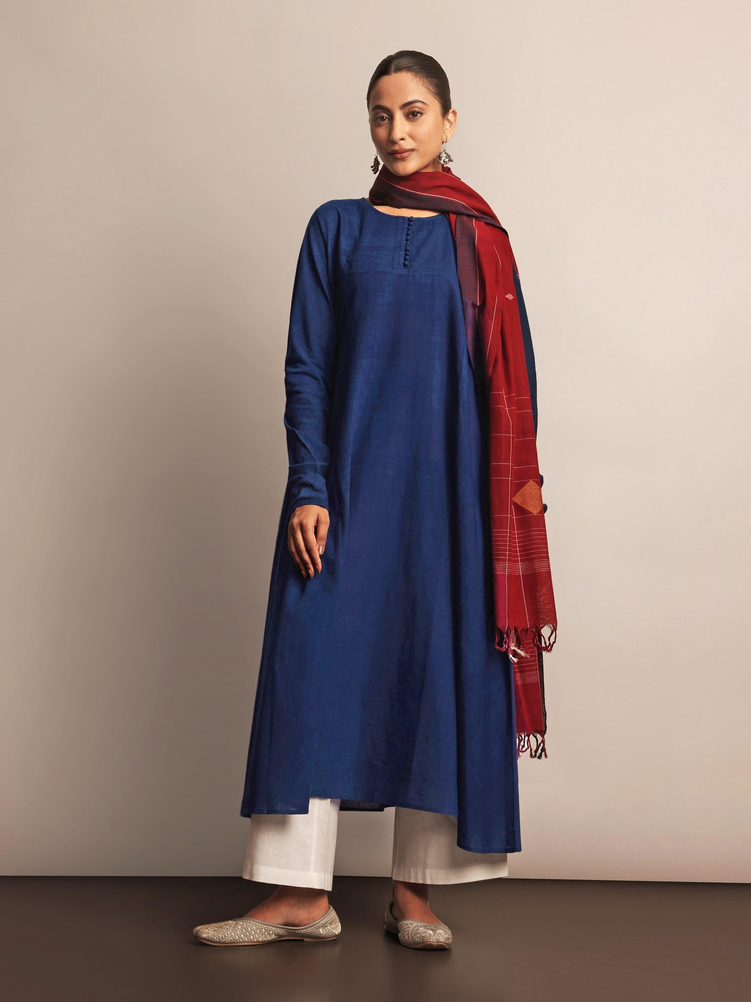 Lifestyle image of indigo Anarkali kurta styled with leggings and dupatta for everyday wear