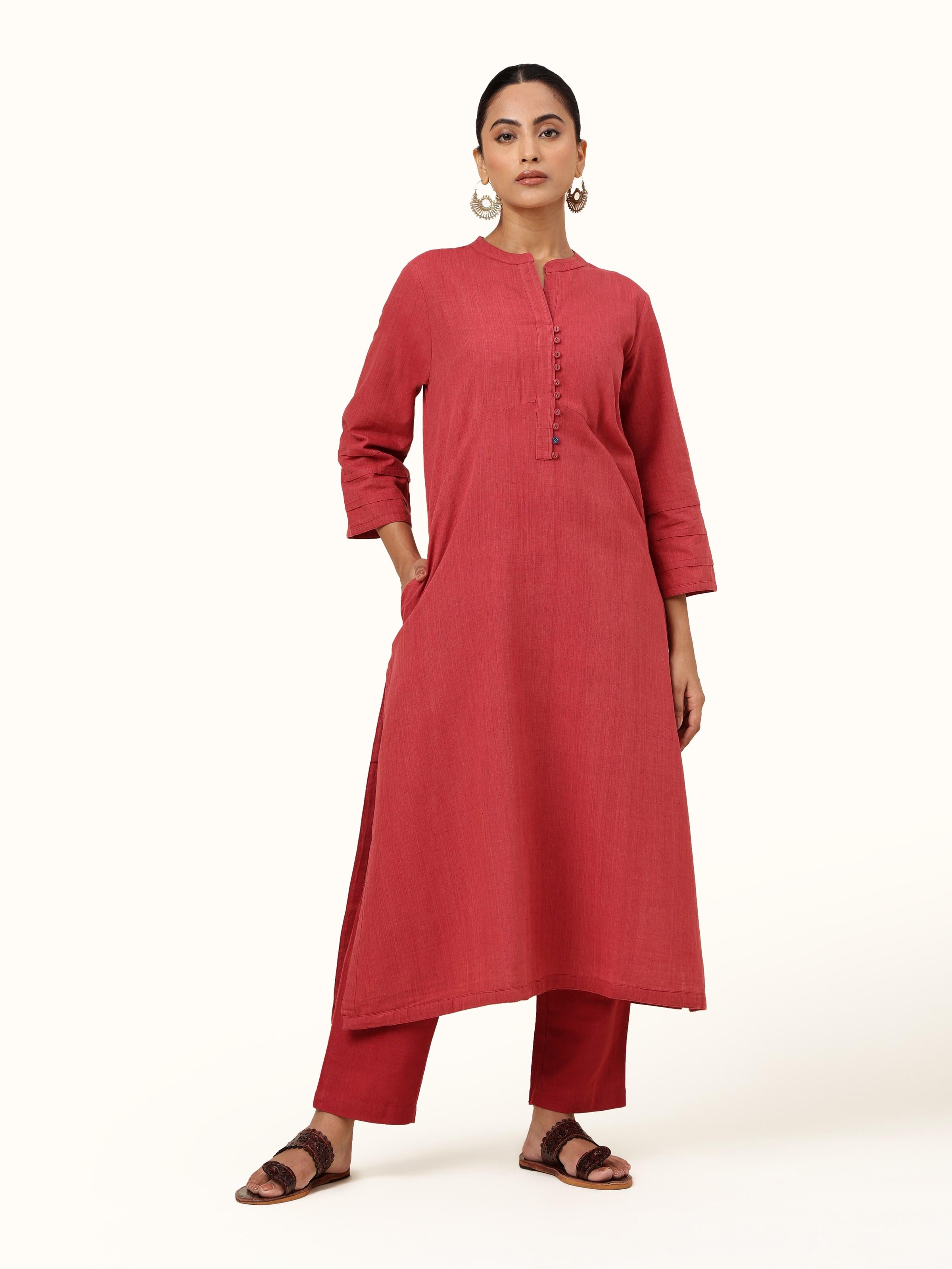 Front view of the red cotton A-line kurta, featuring a flattering silhouette and vibrant color that lends effortless style.