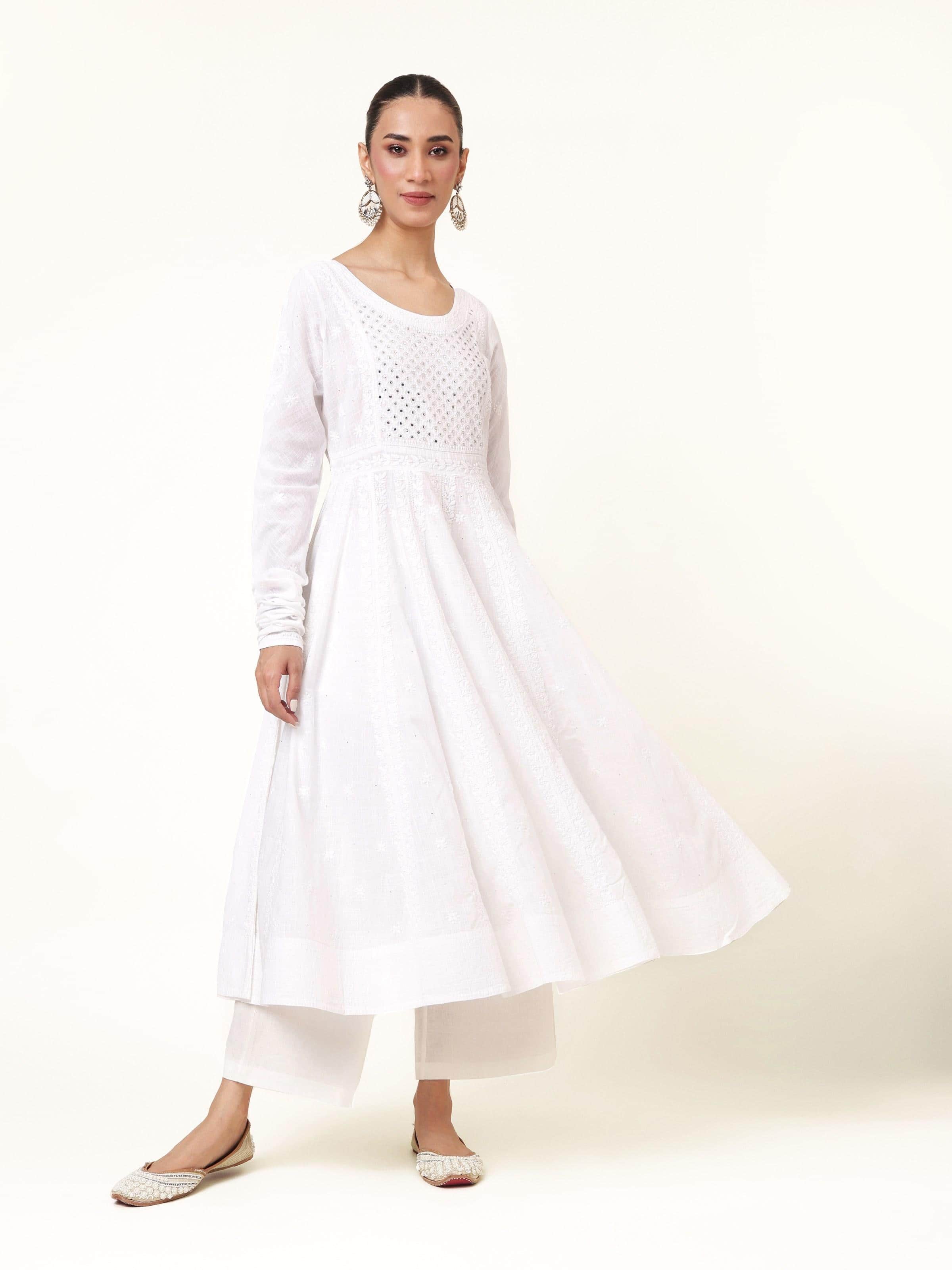 Front view of the white cotton chikankari Anarkali kurta, highlighting the fine embroidery and flared silhouette.