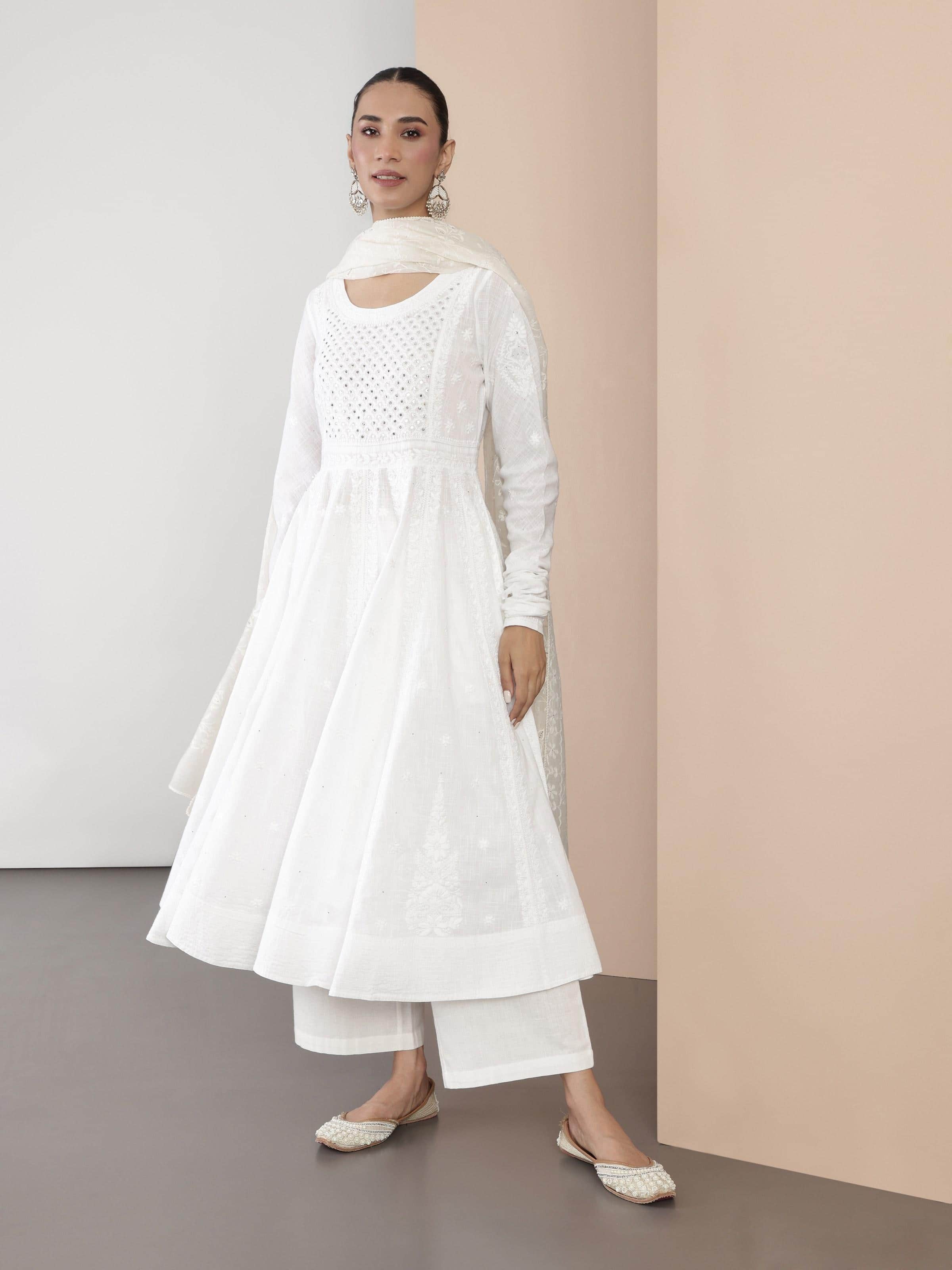 Lifestyle shot showcasing the soft cotton fabric and timeless elegance of chikankari work.