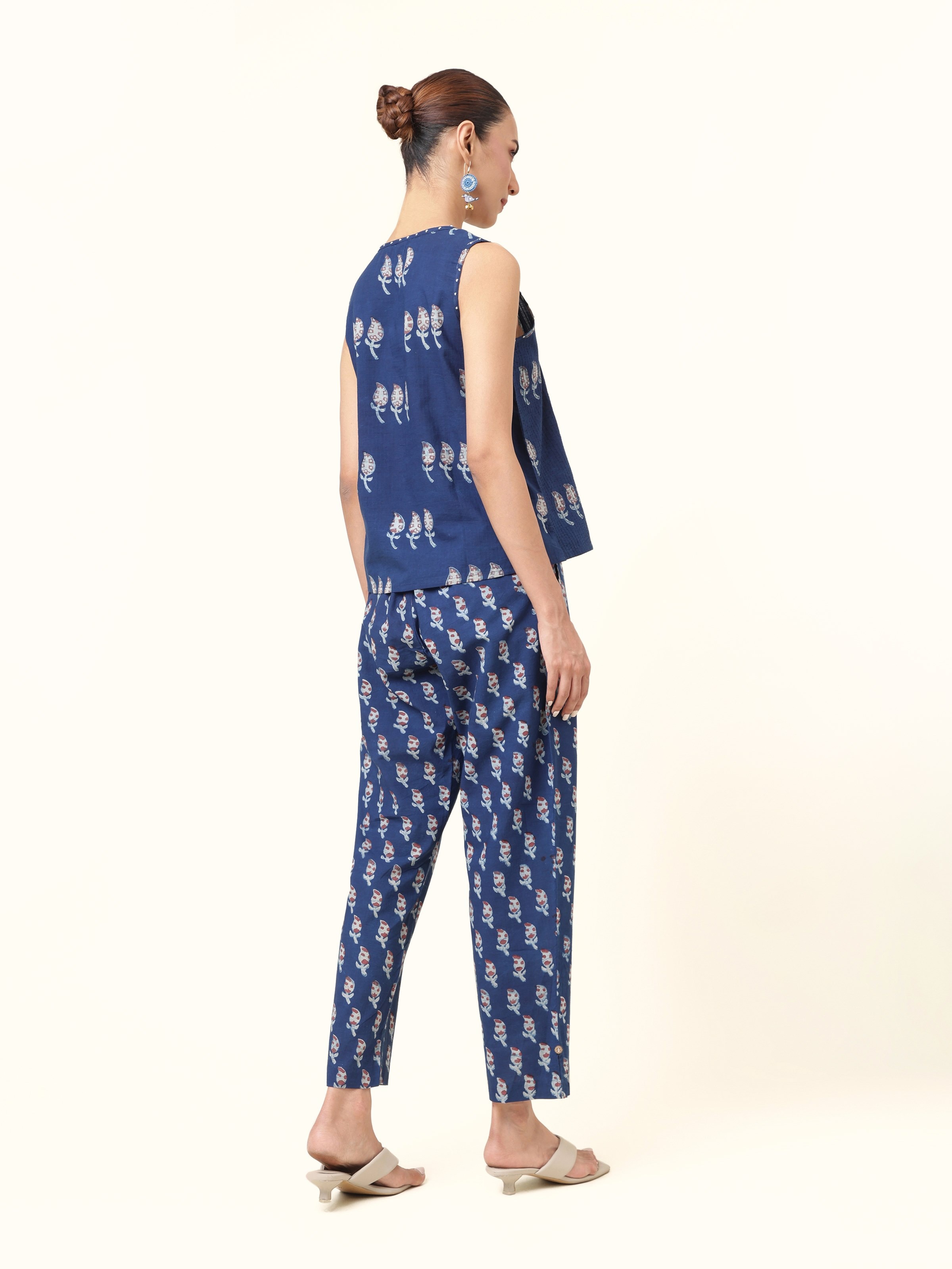 Back view showing the clean silhouette and natural dyed print.