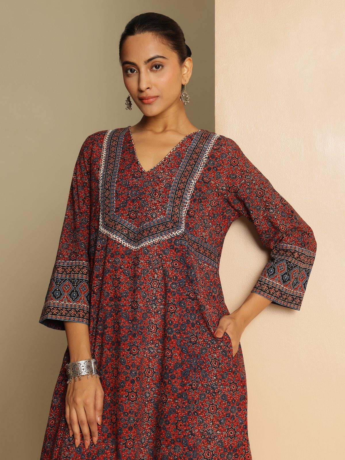 Second lifestyle view of blue Ajrakh A-line kurta styled with leggings and earrings