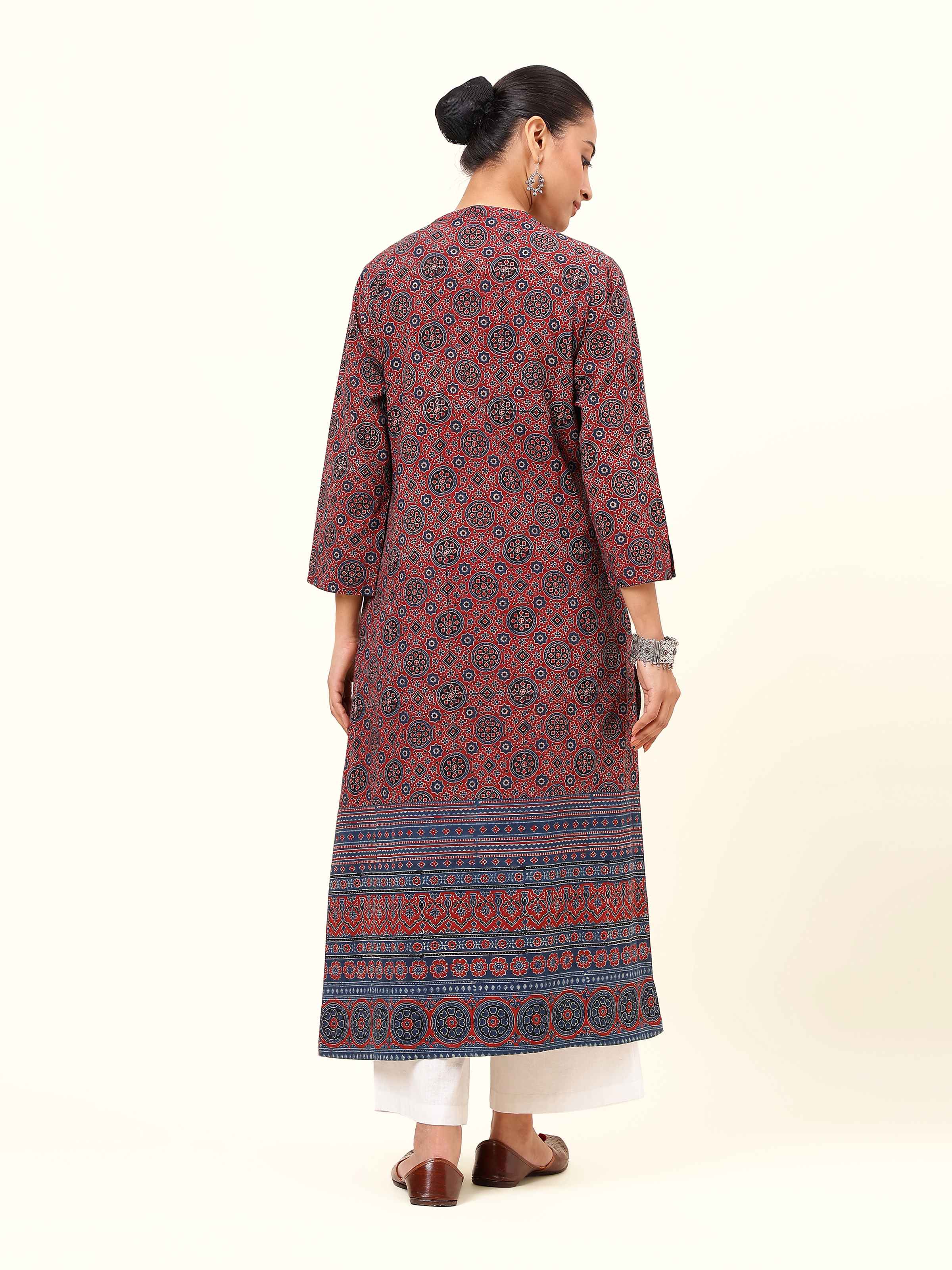 Back view emphasizing the kurta’s refined, traditional finish.