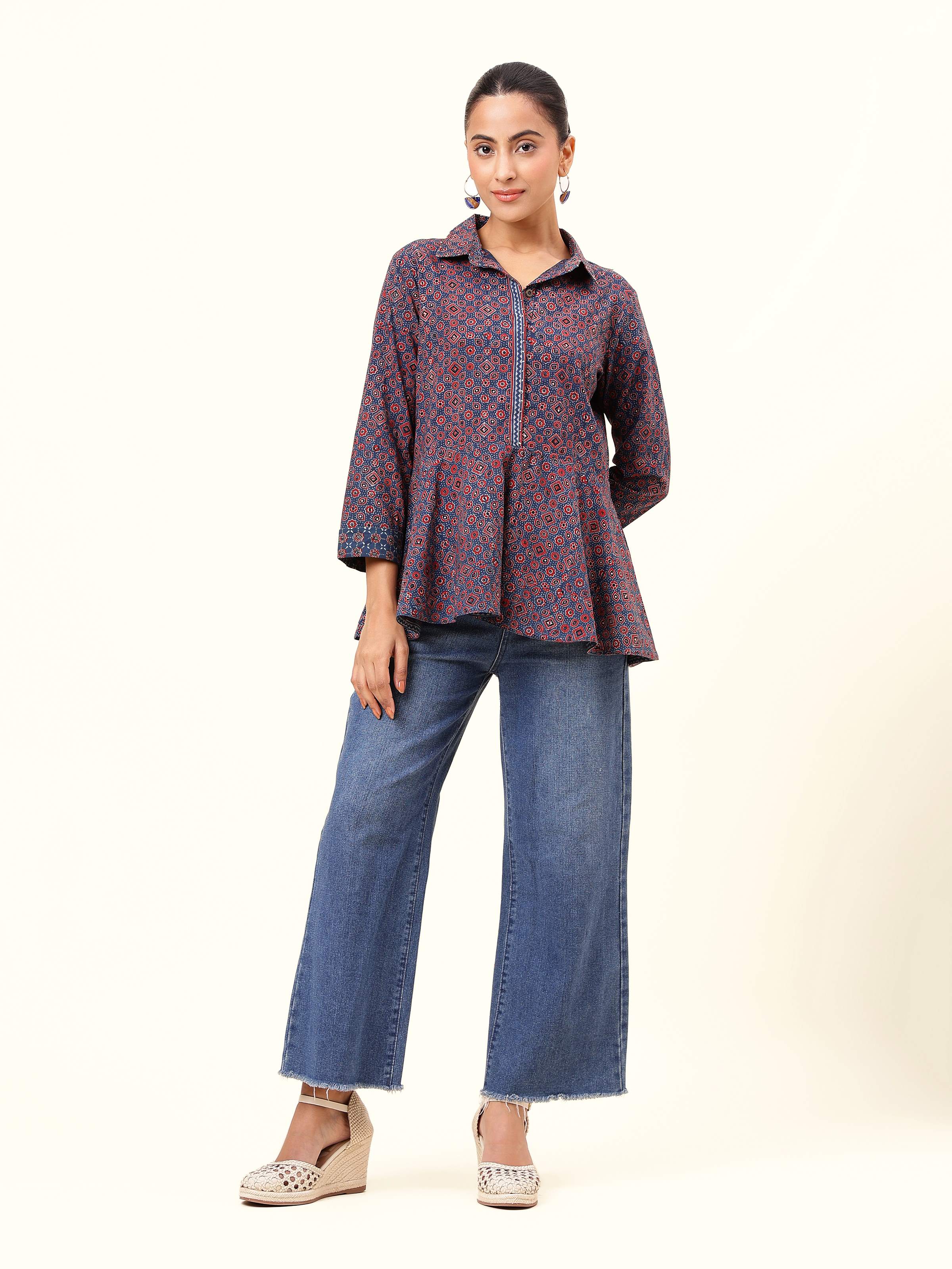 Front view of blue cotton Ajrakh block printed peplum top with round neck