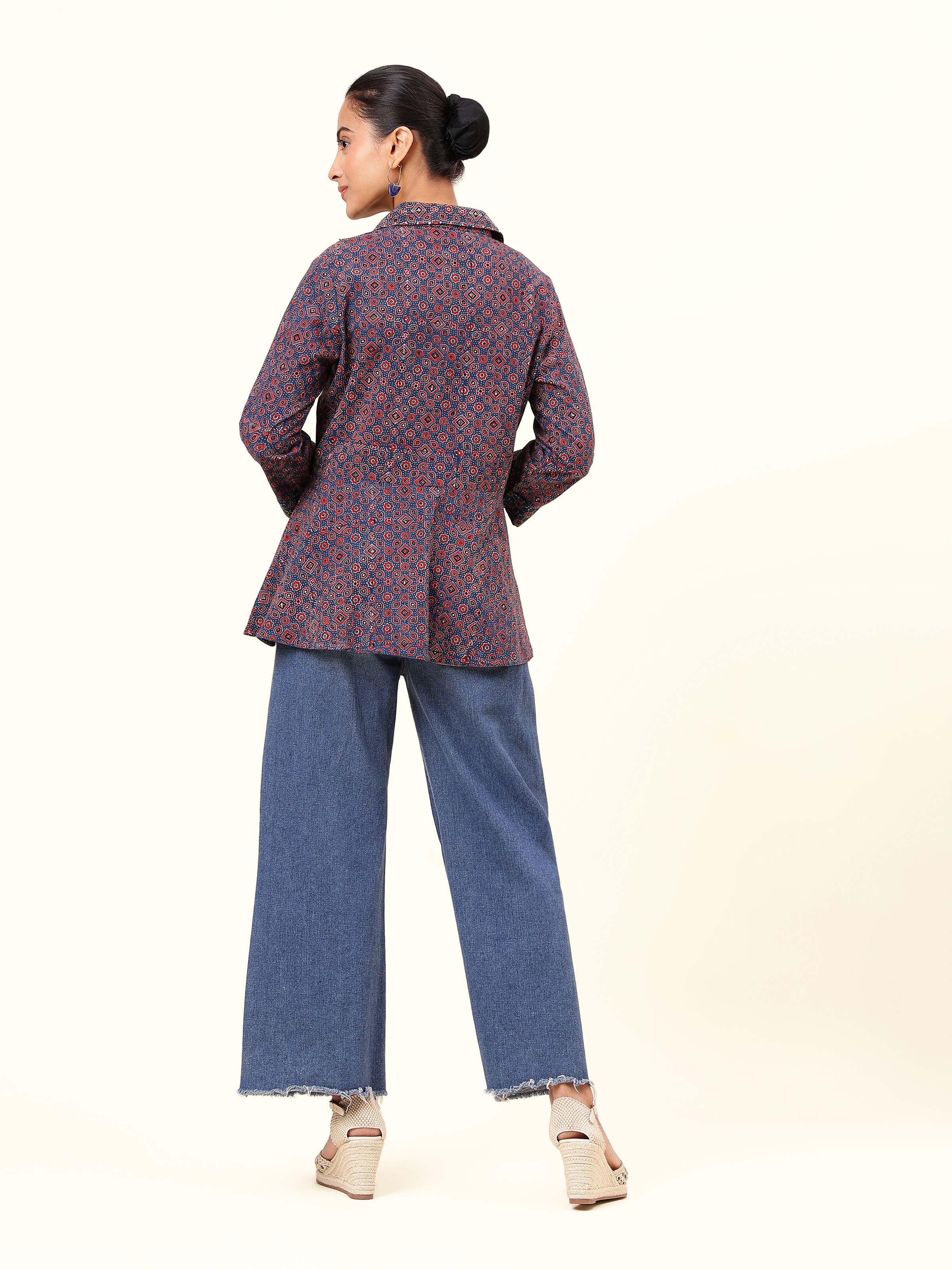 Back view of blue Ajrakh block printed top with keyhole button detail