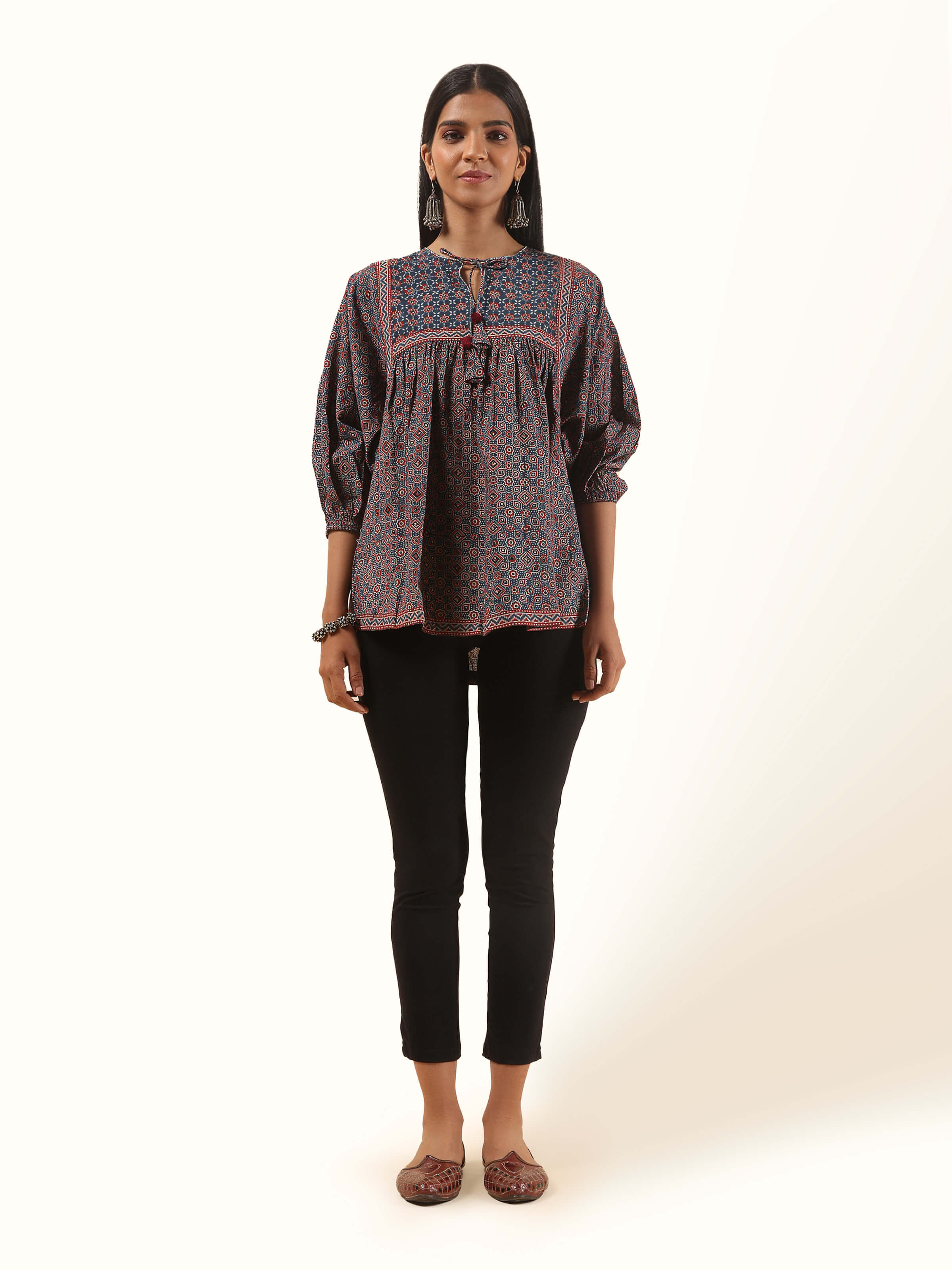 Front view of red cotton Ajrakh block printed boho top with button-down placket and band collar