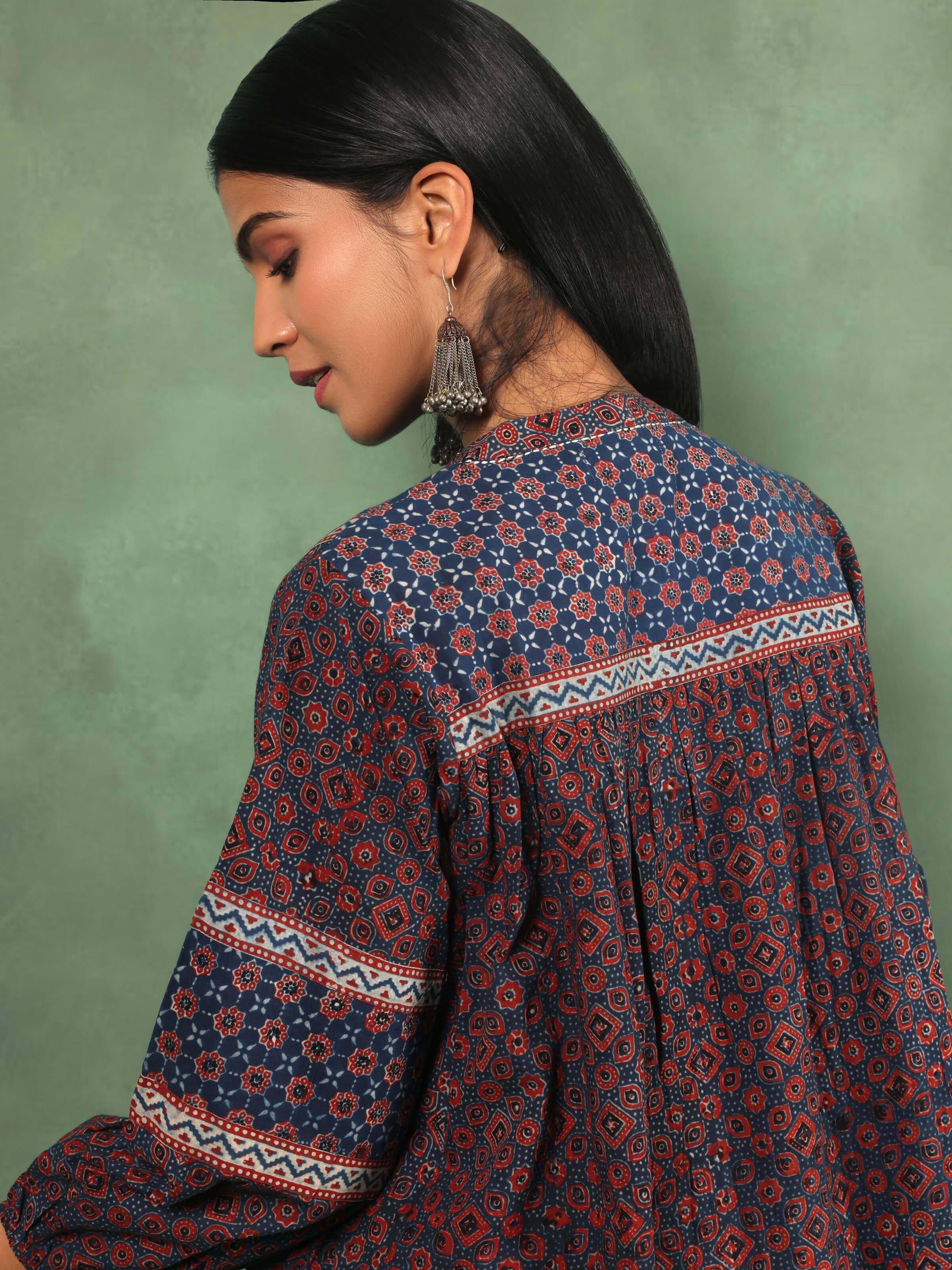 Angled view of cotton dress showcasing Ajrakh print and relaxed fit