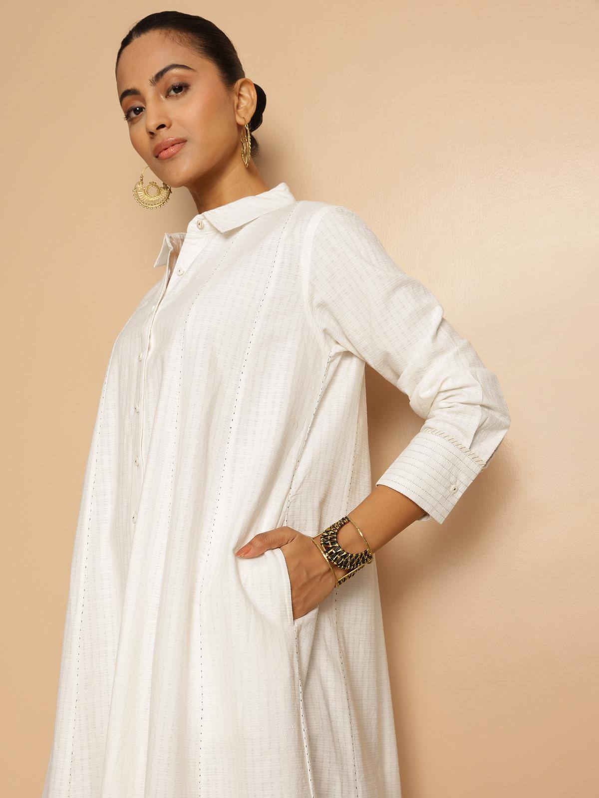 Close-up lifestyle view showing fine stitching and collar detail of cotton straight dress