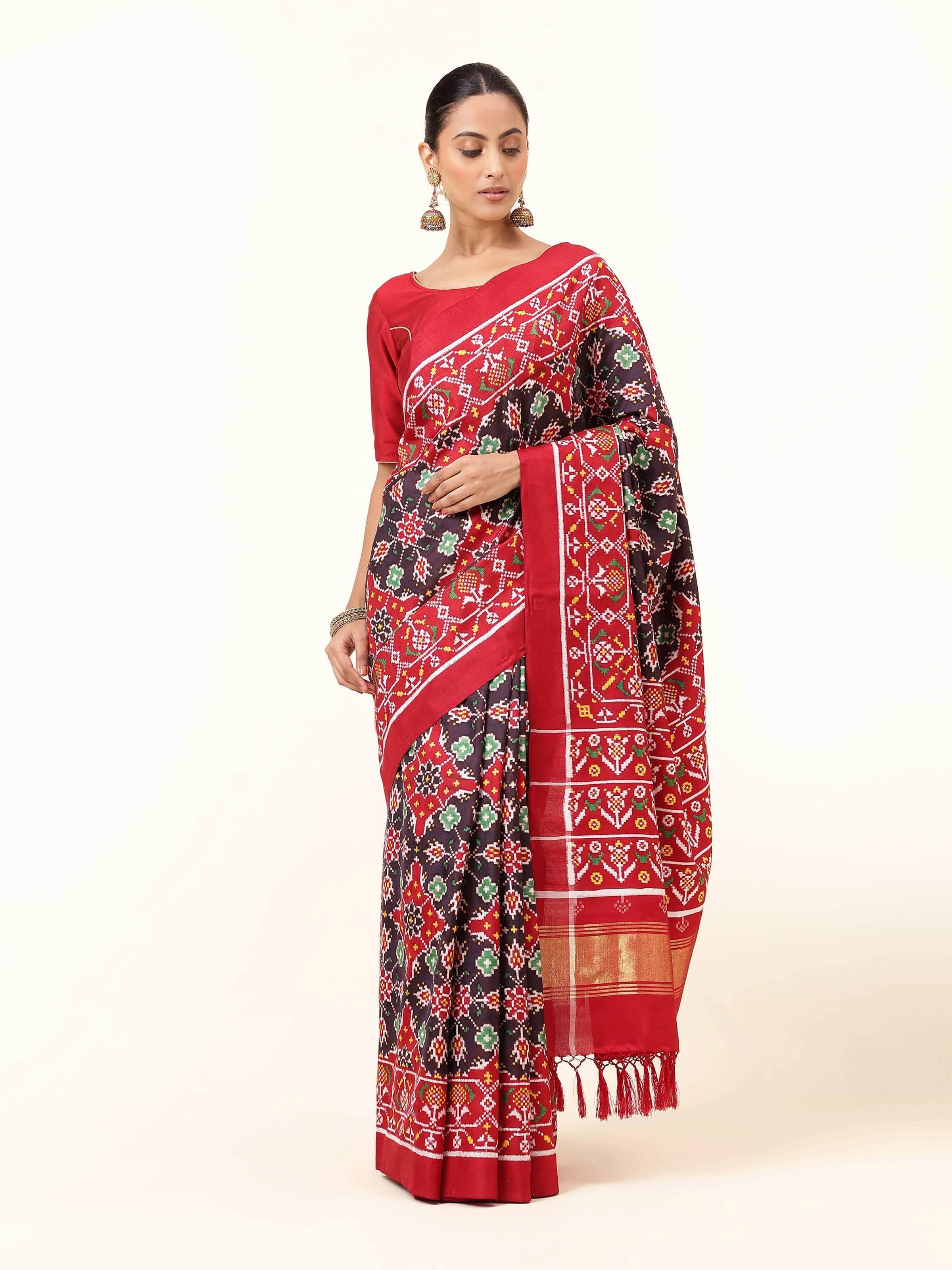 Front view of Black Mulberry Silk Patan Patola Saree featuring bold geometric patterns