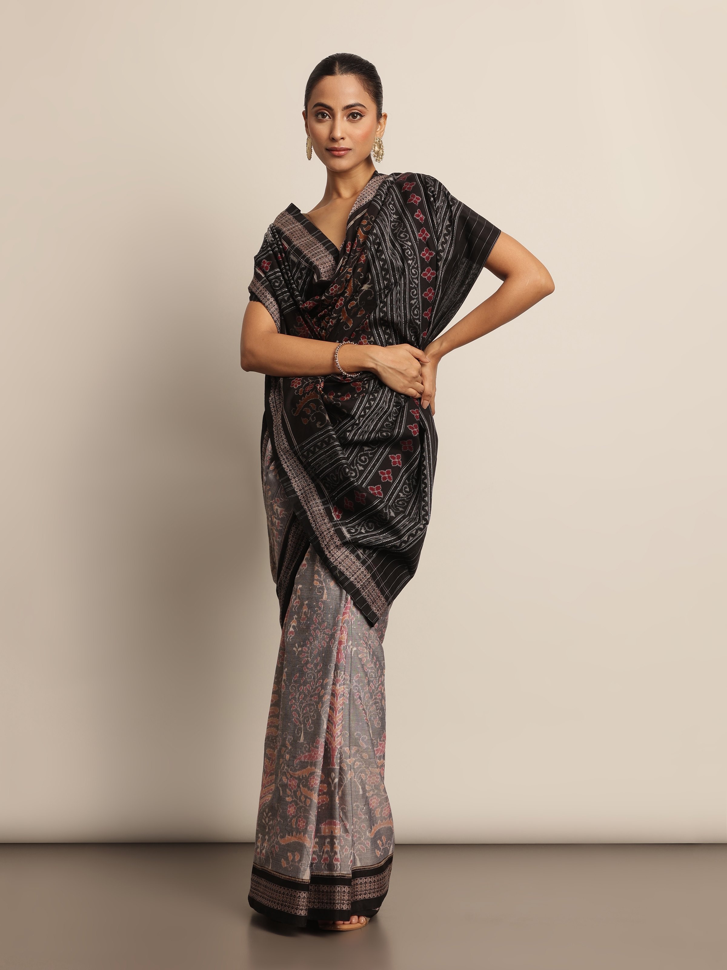 Close-up of intricate Bandha tie-dye Ikat design on cotton fabric.