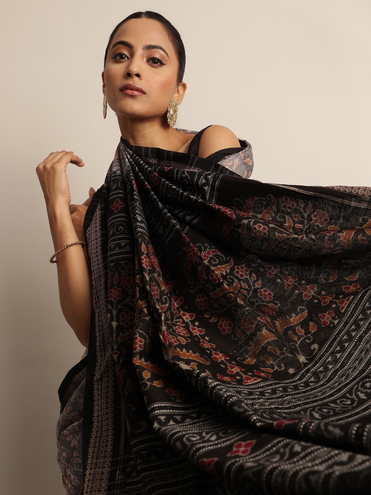 Draped image showing soft texture and authentic Odisha Ikat weaving.