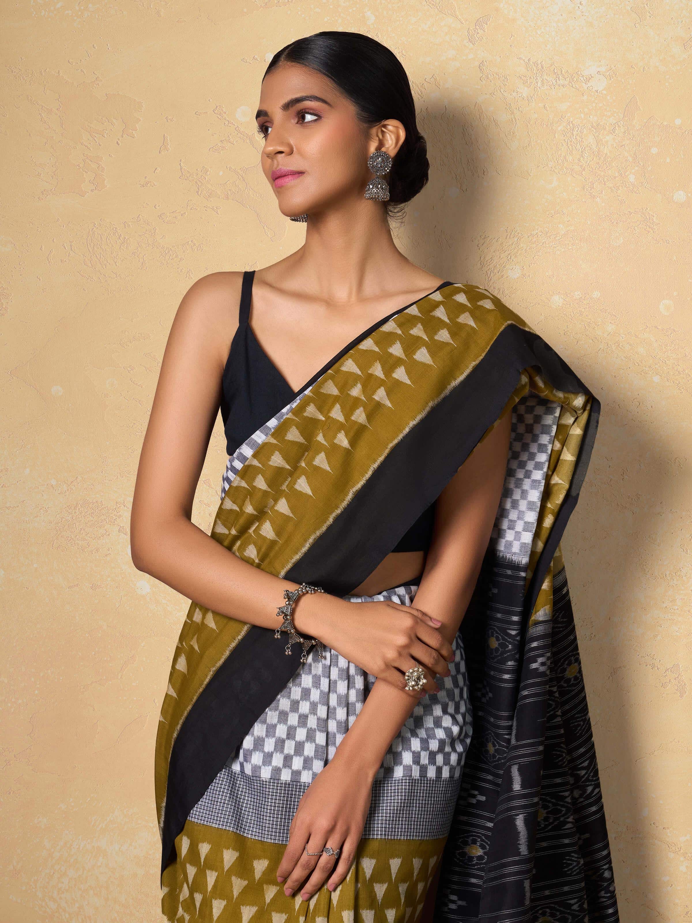 Angled view focusing on cotton texture and distinct bandha ikat designs