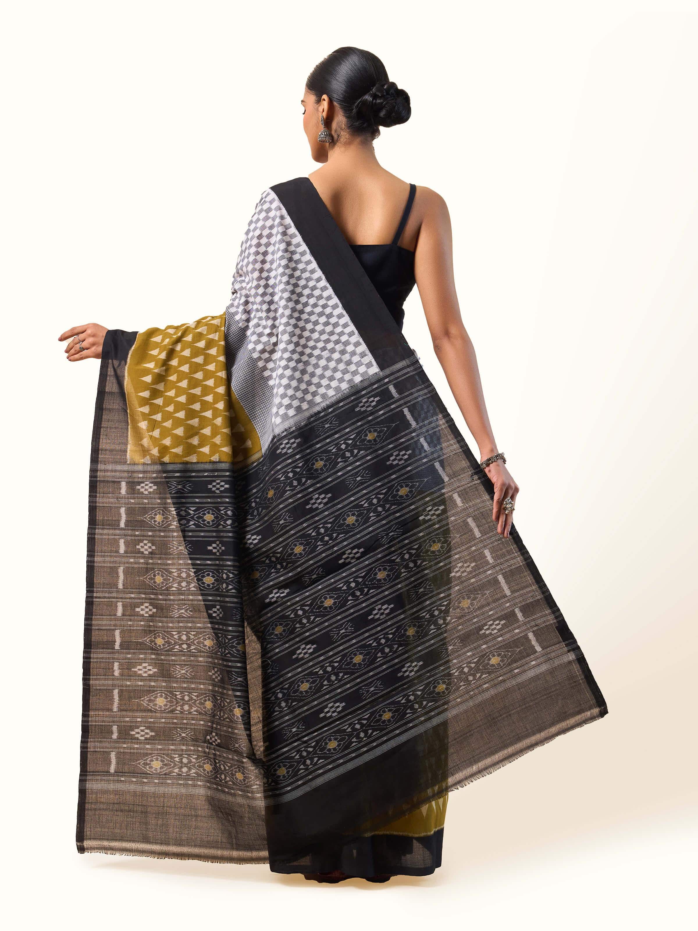 Back view showing full pallu and bandha ikat motif continuity on Mustard Cotton Saree