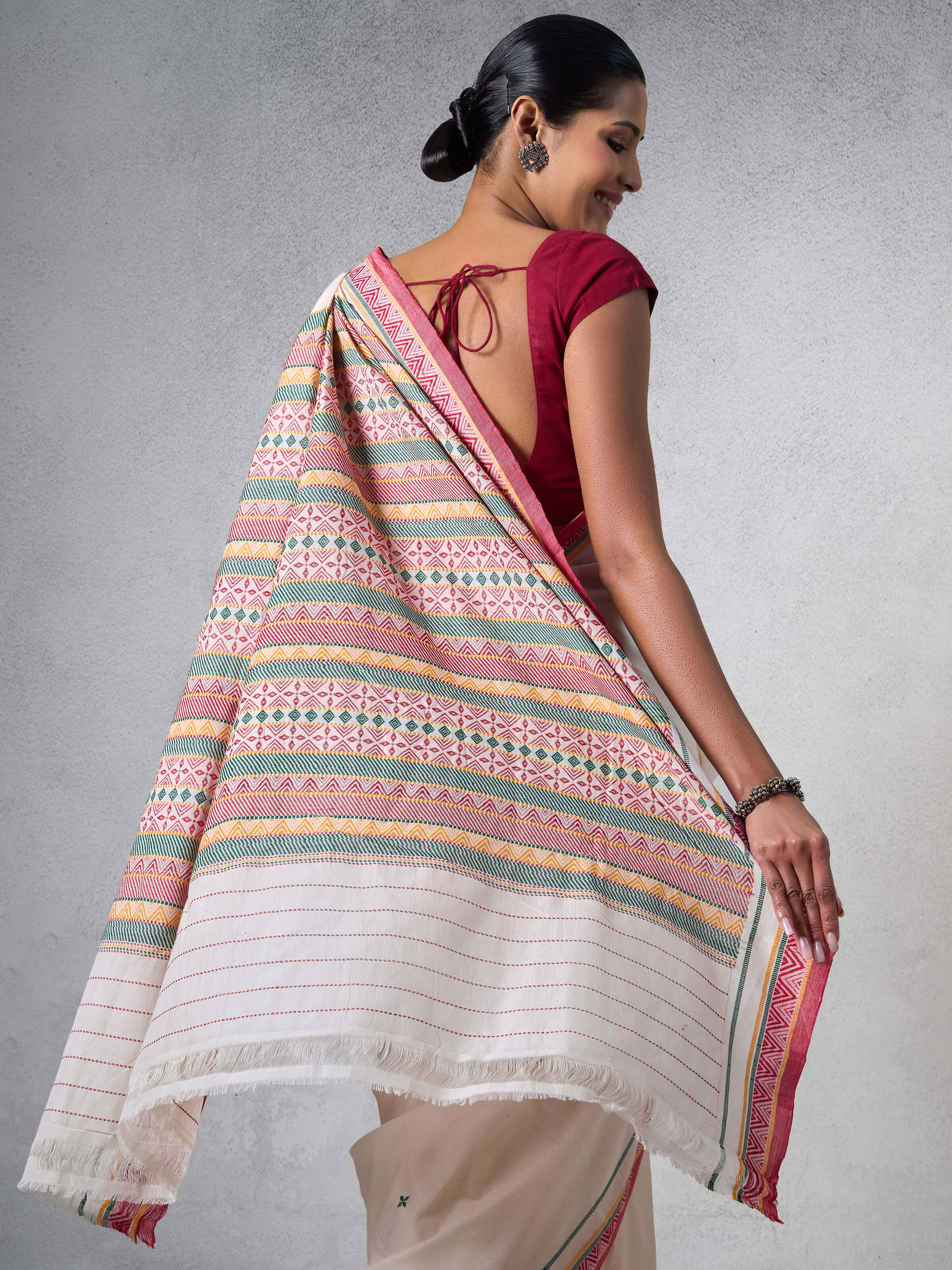 Lifestyle view of Off-white Cotton Dongaria Saree draped naturally emphasizing softness and hand-spun cotton
