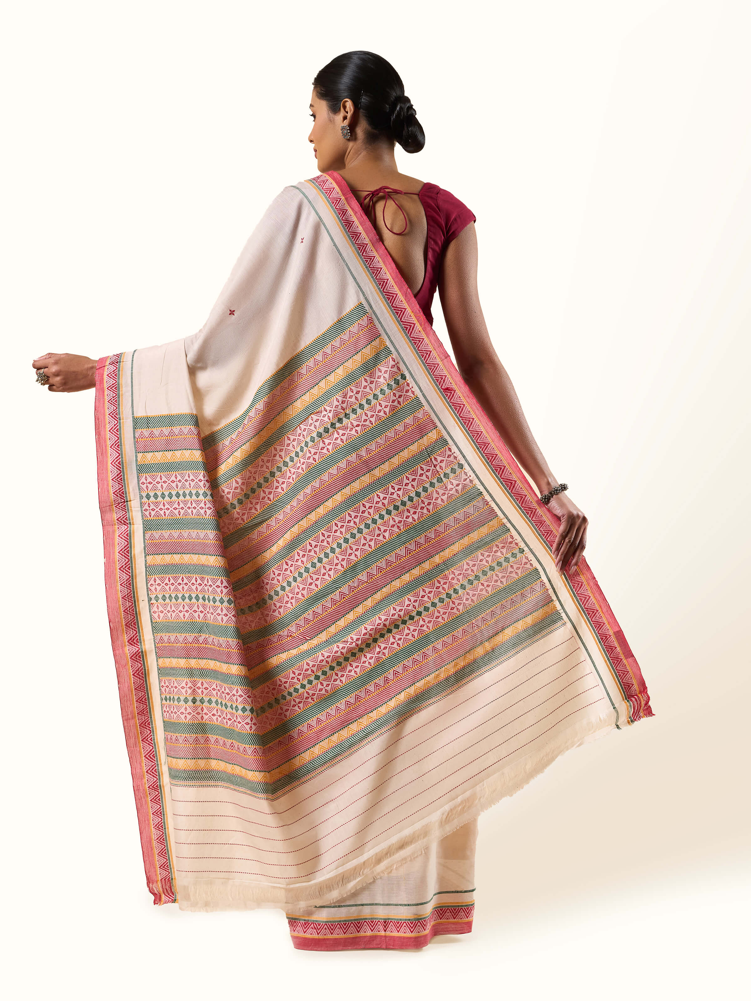 Back view of Off-white Cotton Dongaria Saree showing the full length and woven details