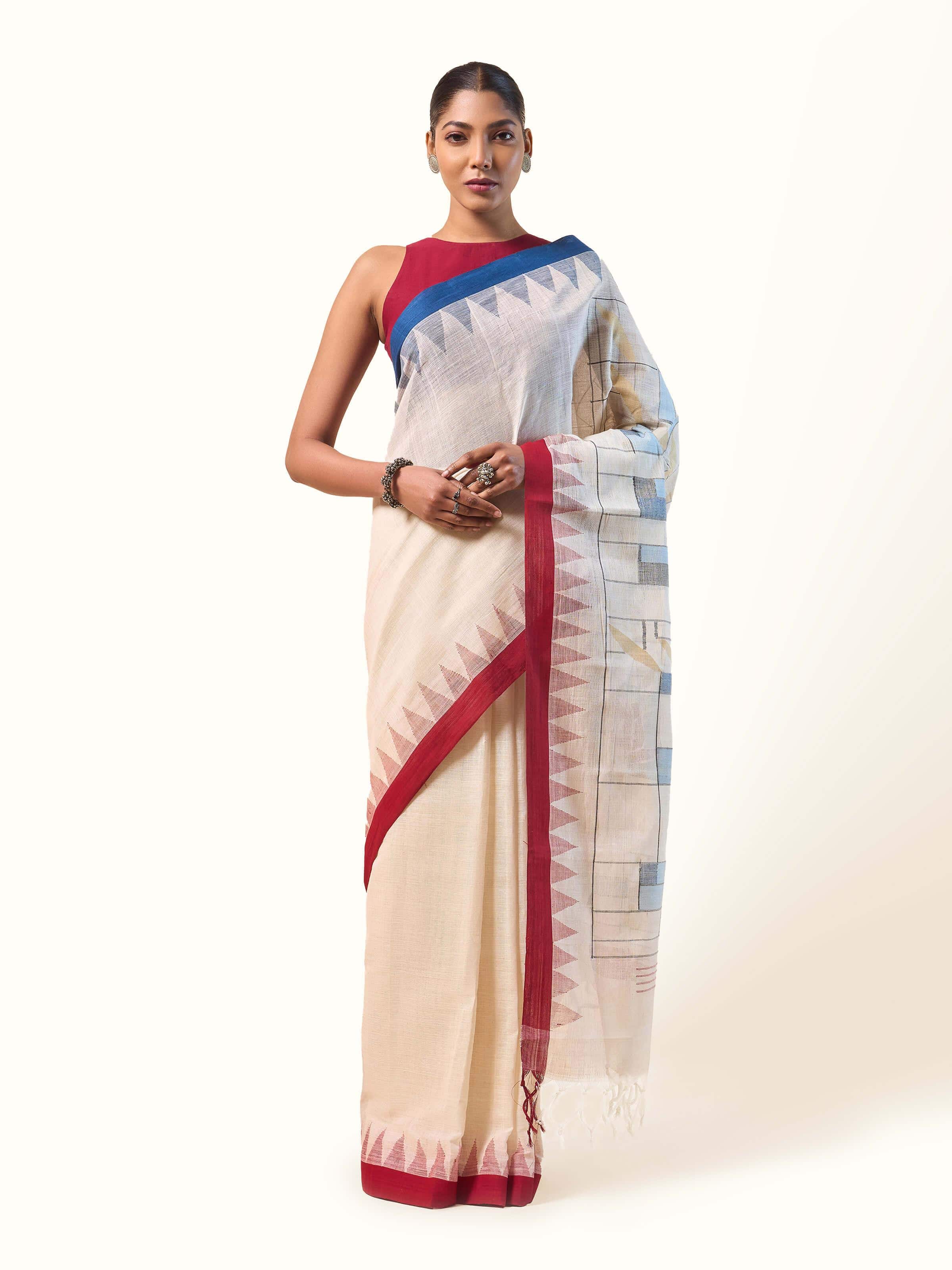 Front view of off-white cotton Jamdani saree featuring delicate handwoven motifs and a soft texture.