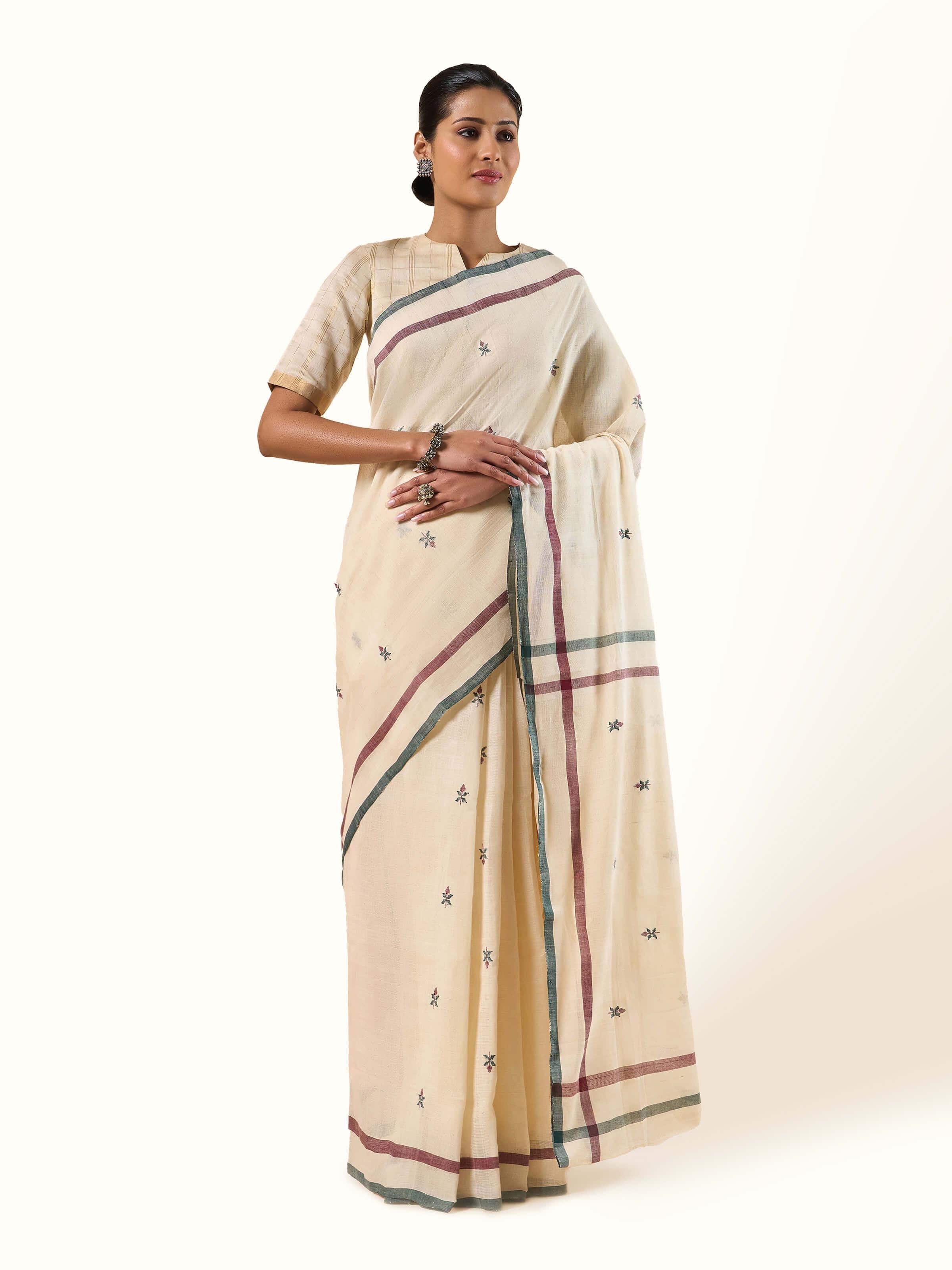 Off-white Uppada Jamdani cotton saree with handwoven motifs