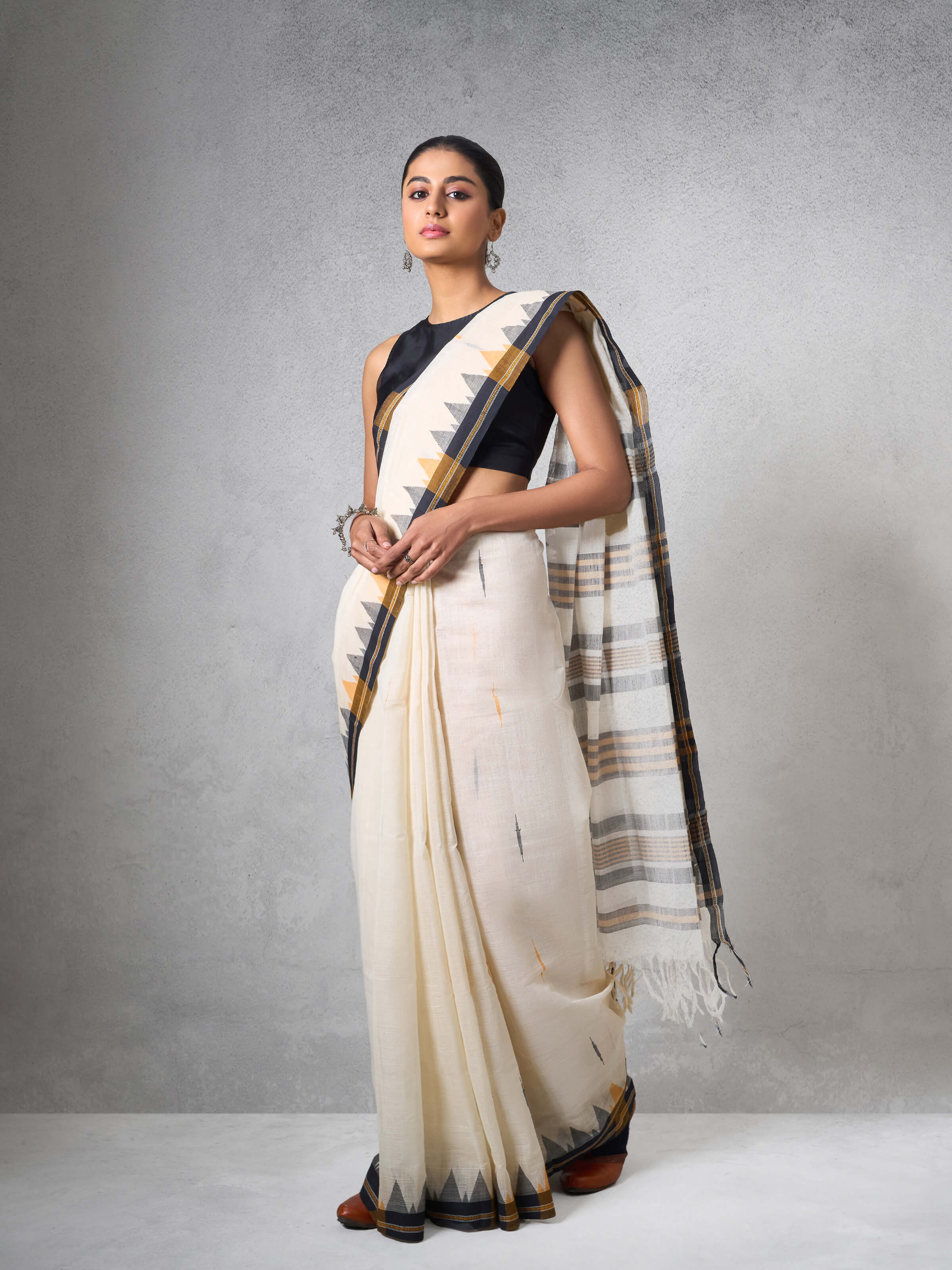 Lifestyle image highlighting the handcrafted weave and subtle tone.