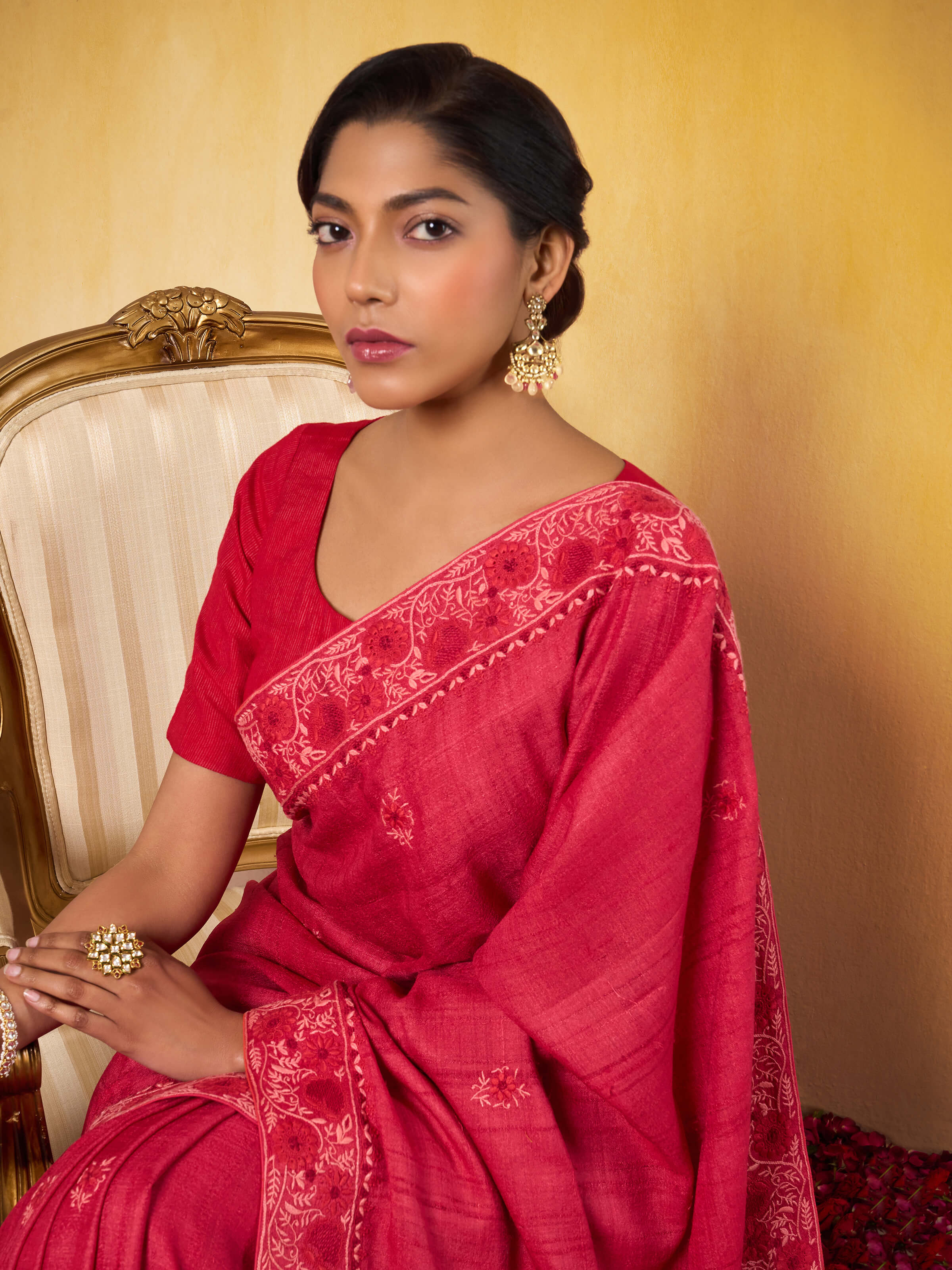 Angled view capturing the intricate chikankari work and elegant silk texture