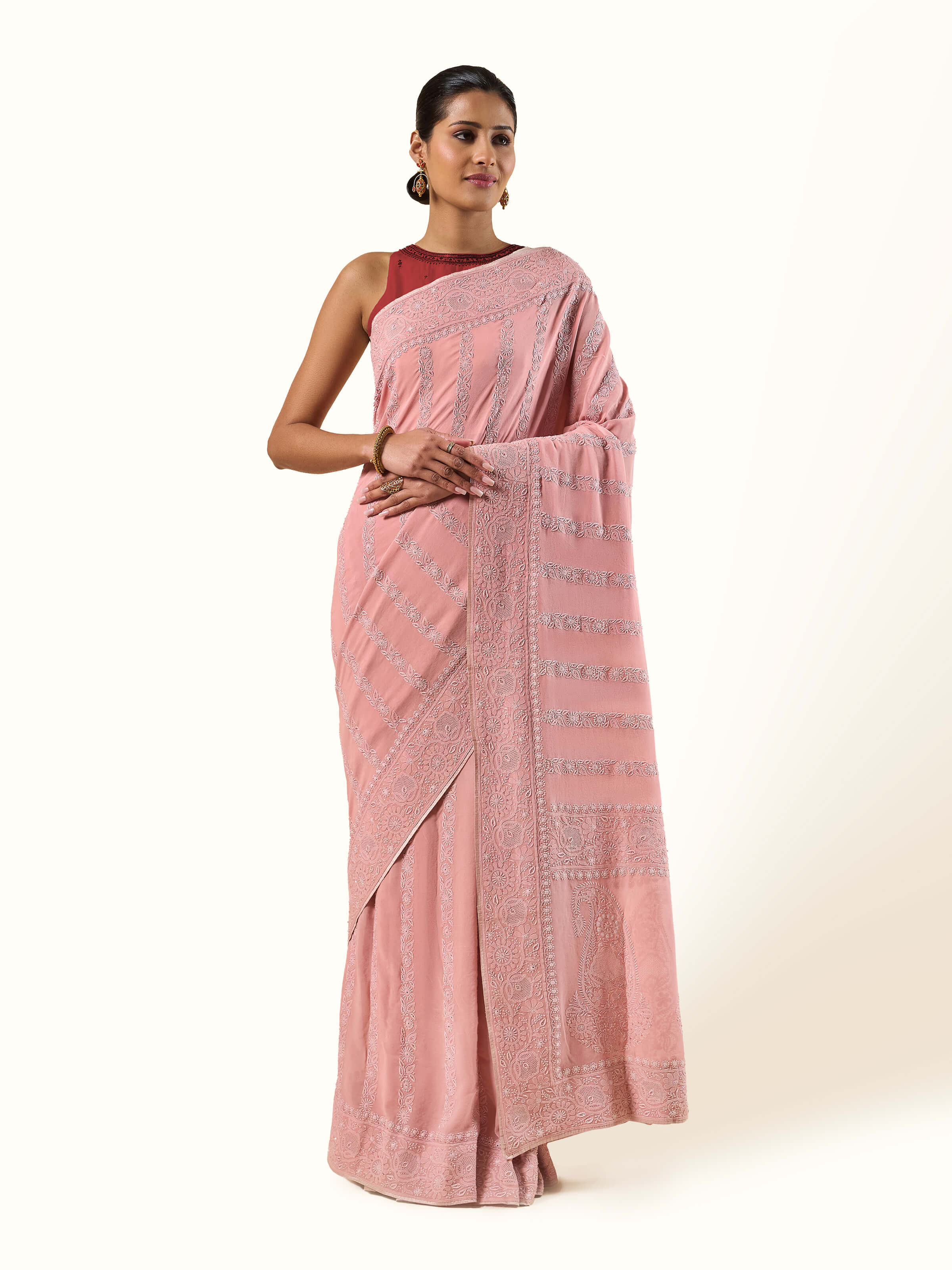 Front view of Pink Silk Georgette Chikankari Saree featuring delicate embroidery on sheer fabric.