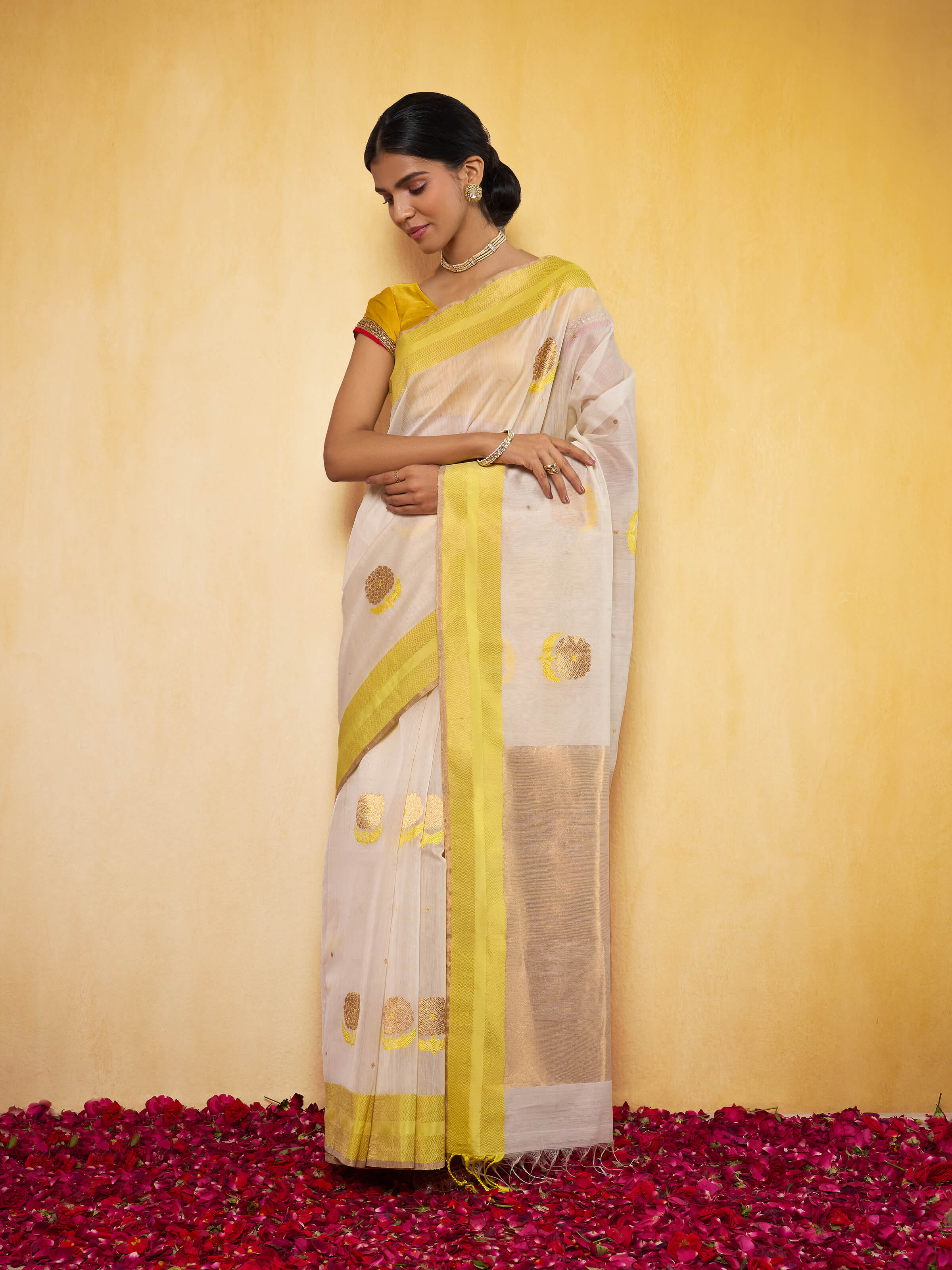 Off-white mulberry silk Chanderi saree lifestyle view styled on model highlighting drape and fabric flow