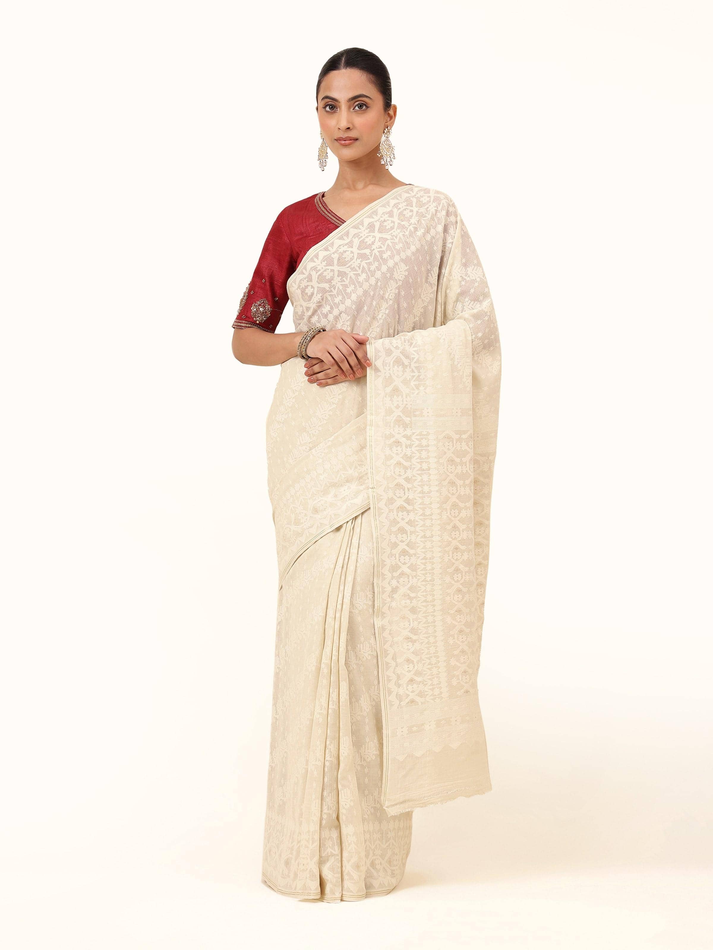 Off-white muslin cotton Jamdani saree front view highlighting fine muslin weave and delicate Jamdani motifs
