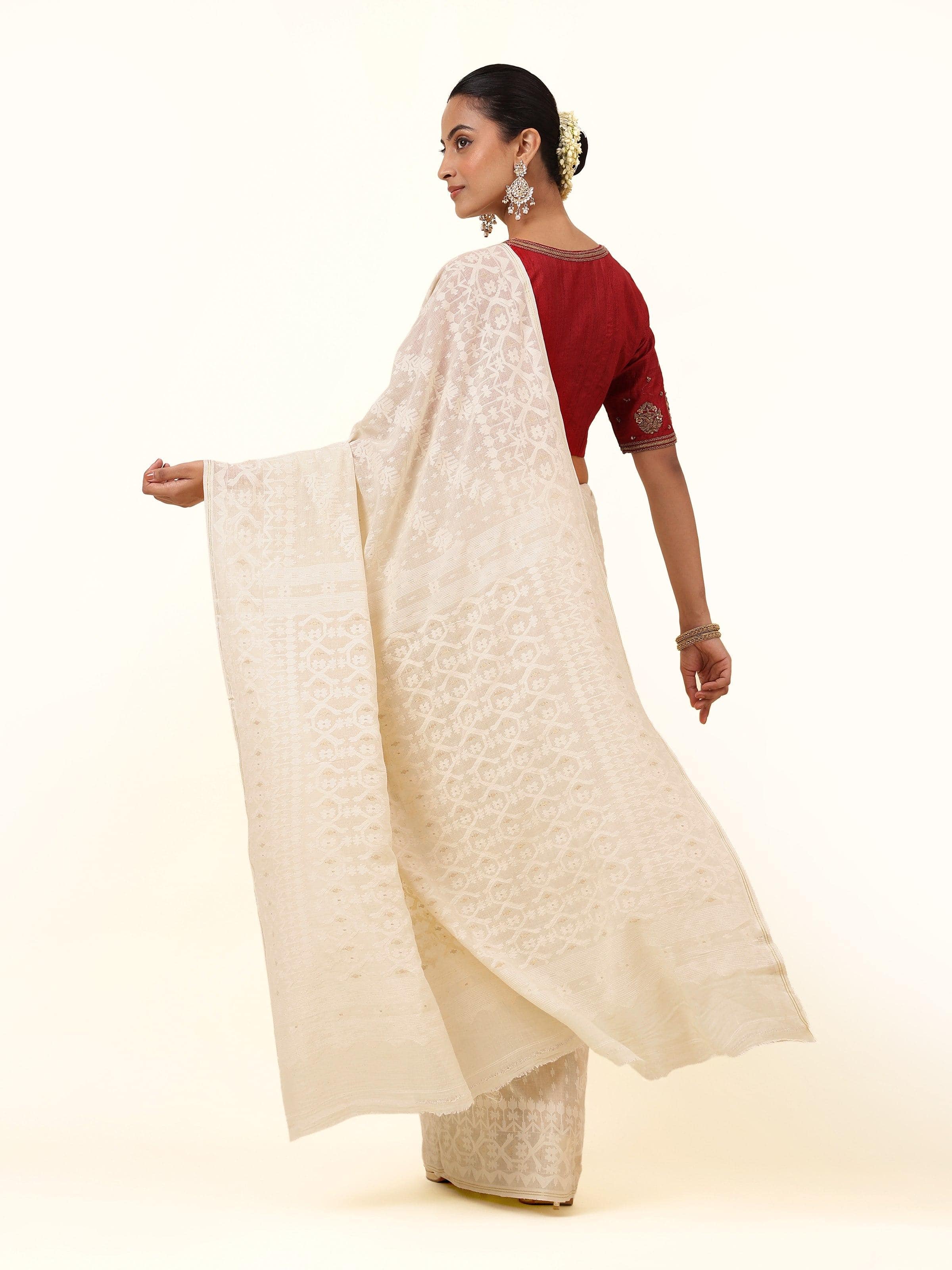 Off-white muslin cotton Jamdani saree back view displaying sheer fabric and woven motifs in full view