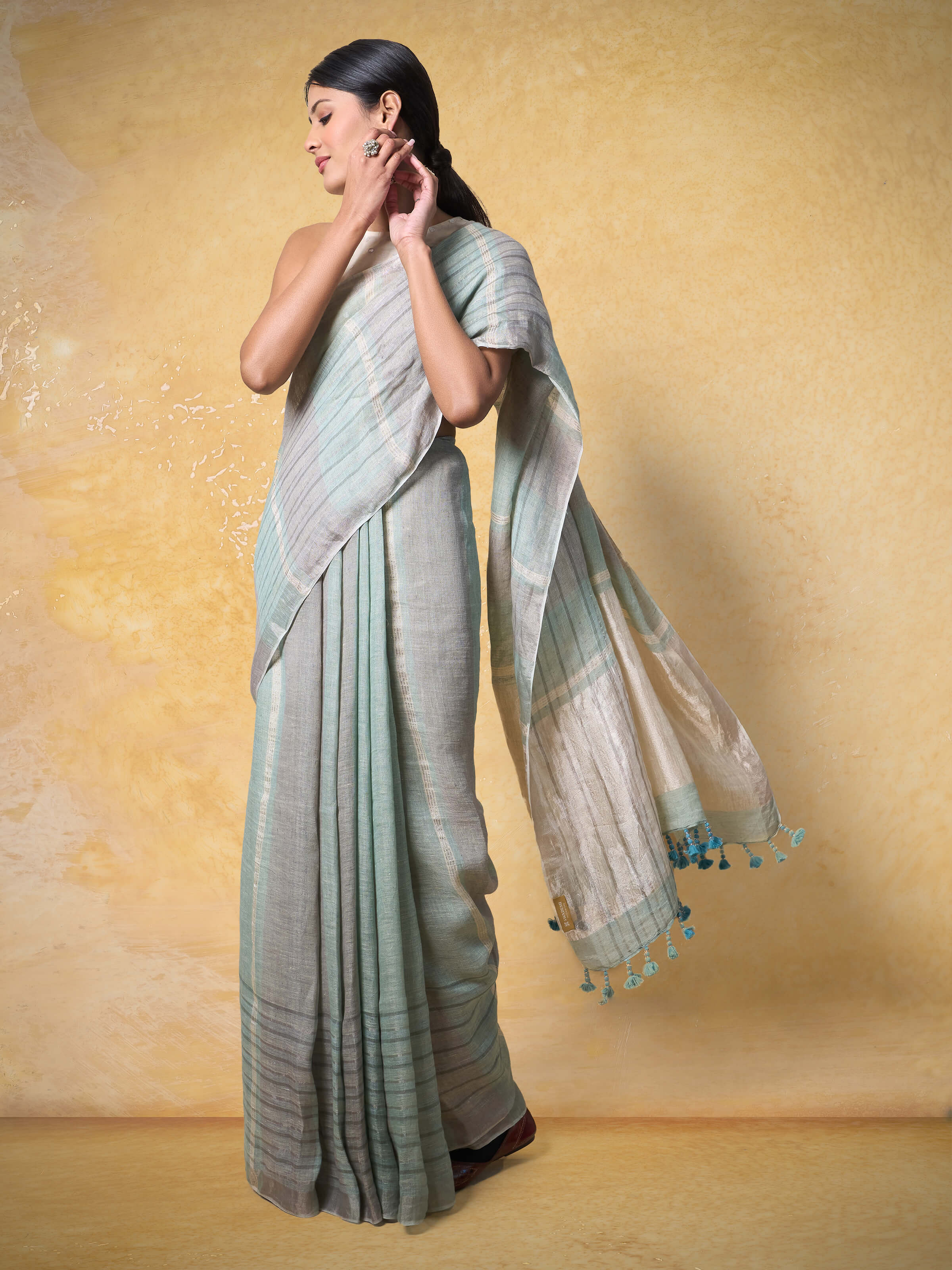 Lifestyle image capturing the breezy drape and subtle shimmer.