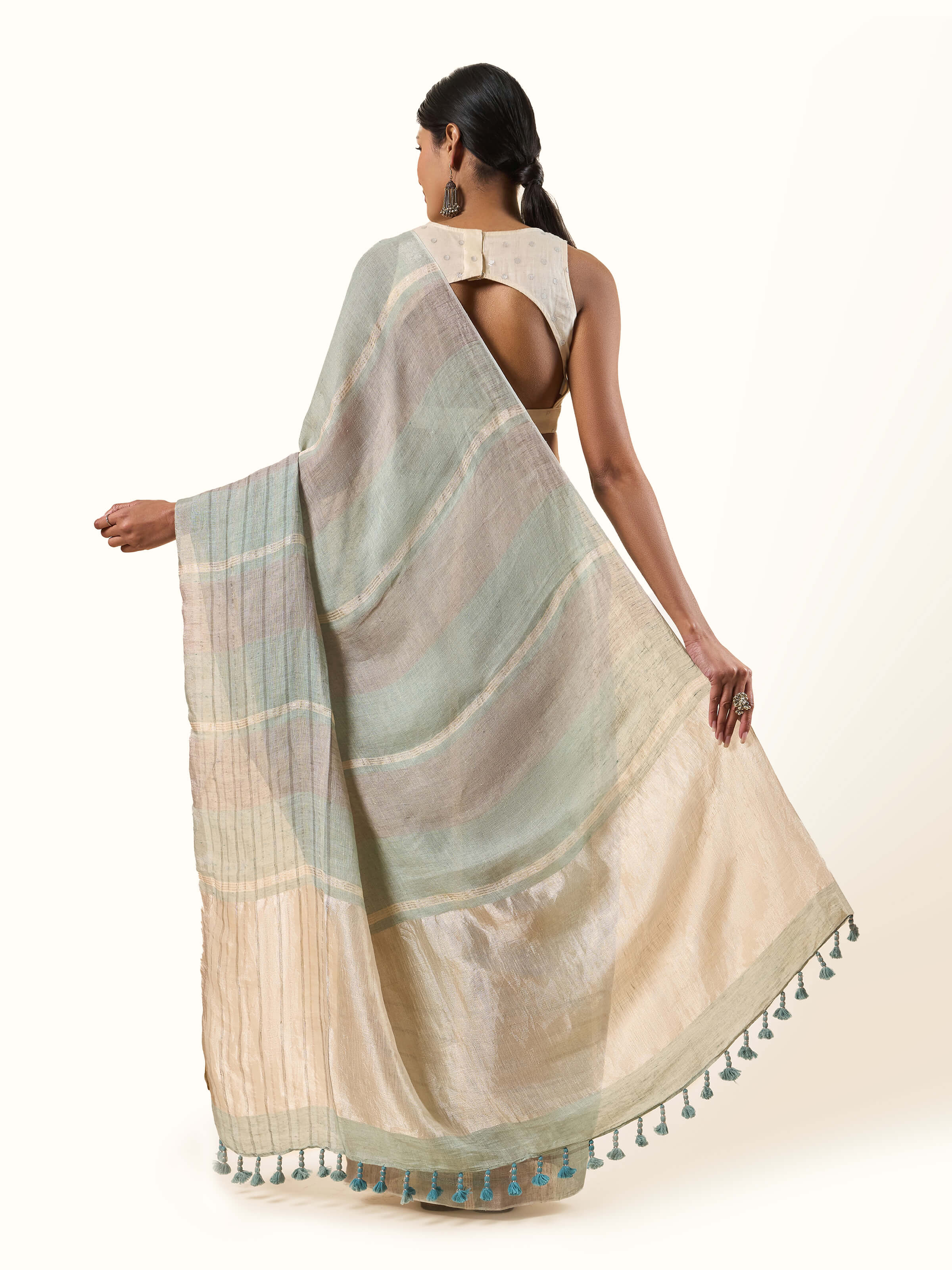 Back view showing the muted elegance and minimalistic grace.