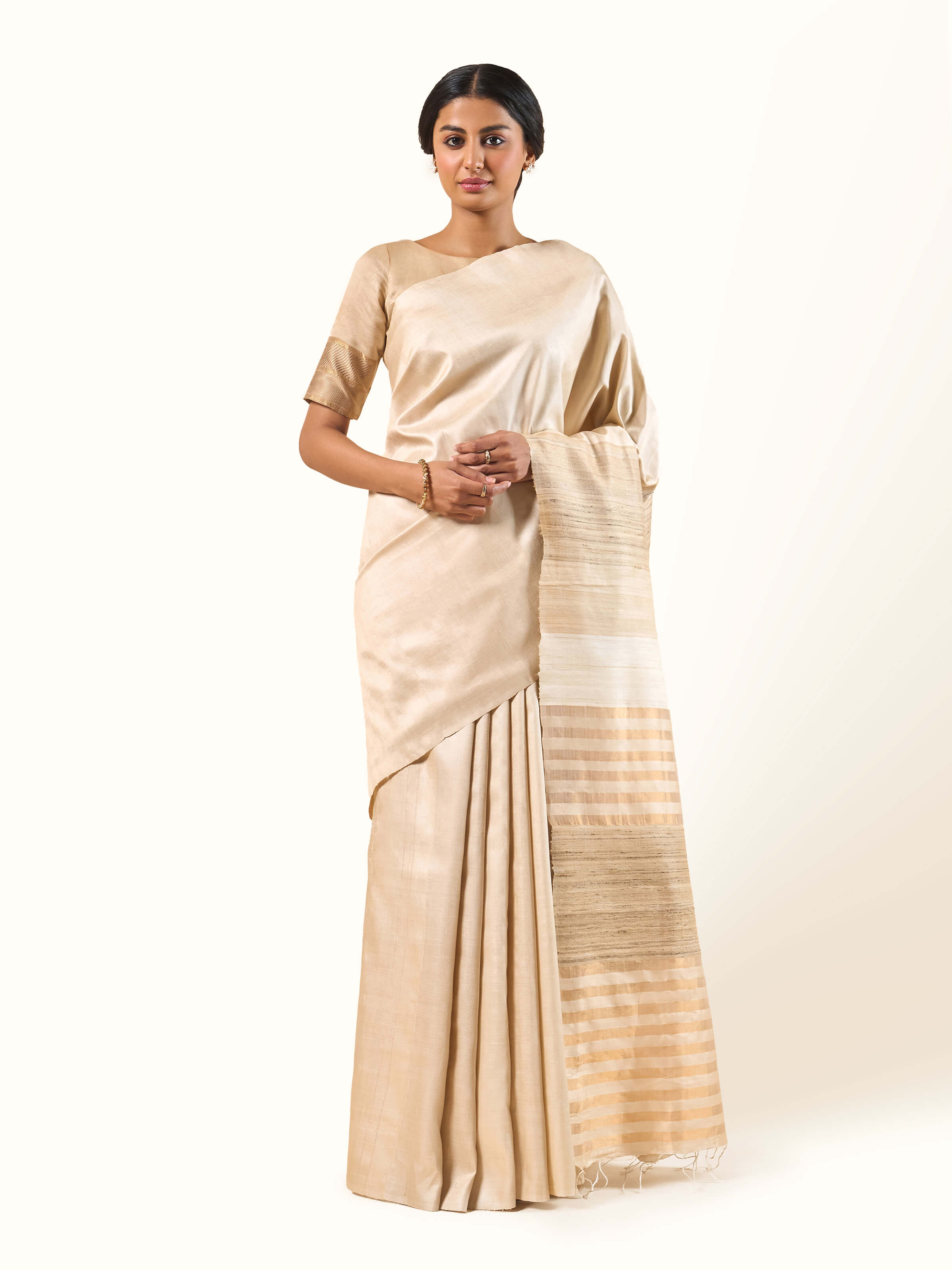 Front view of the Beige & Pink Tussar Silk Saree highlighting the soft silk texture and color contrast