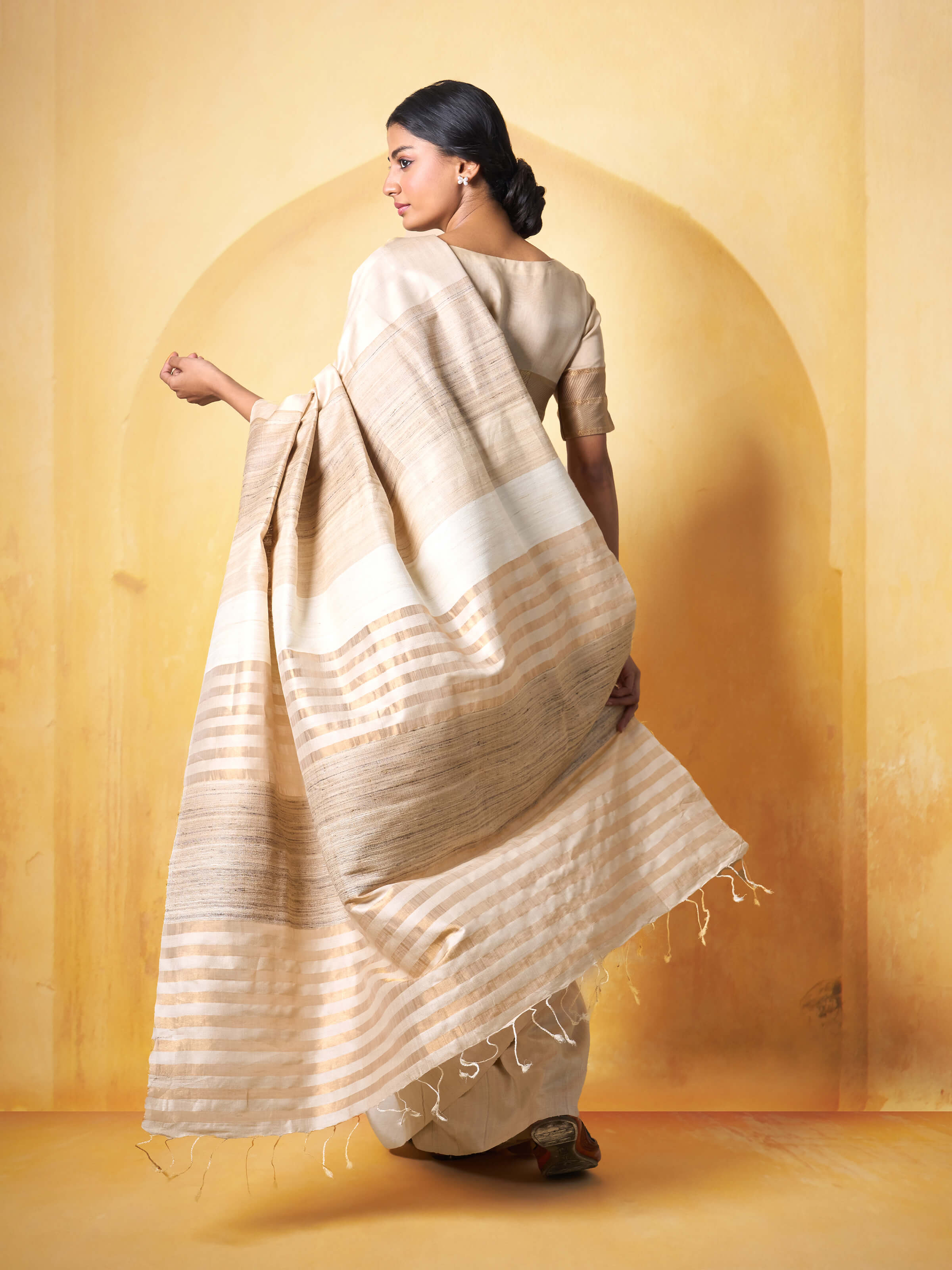 Angled view emphasizing the subtle sheen and refined weaving details