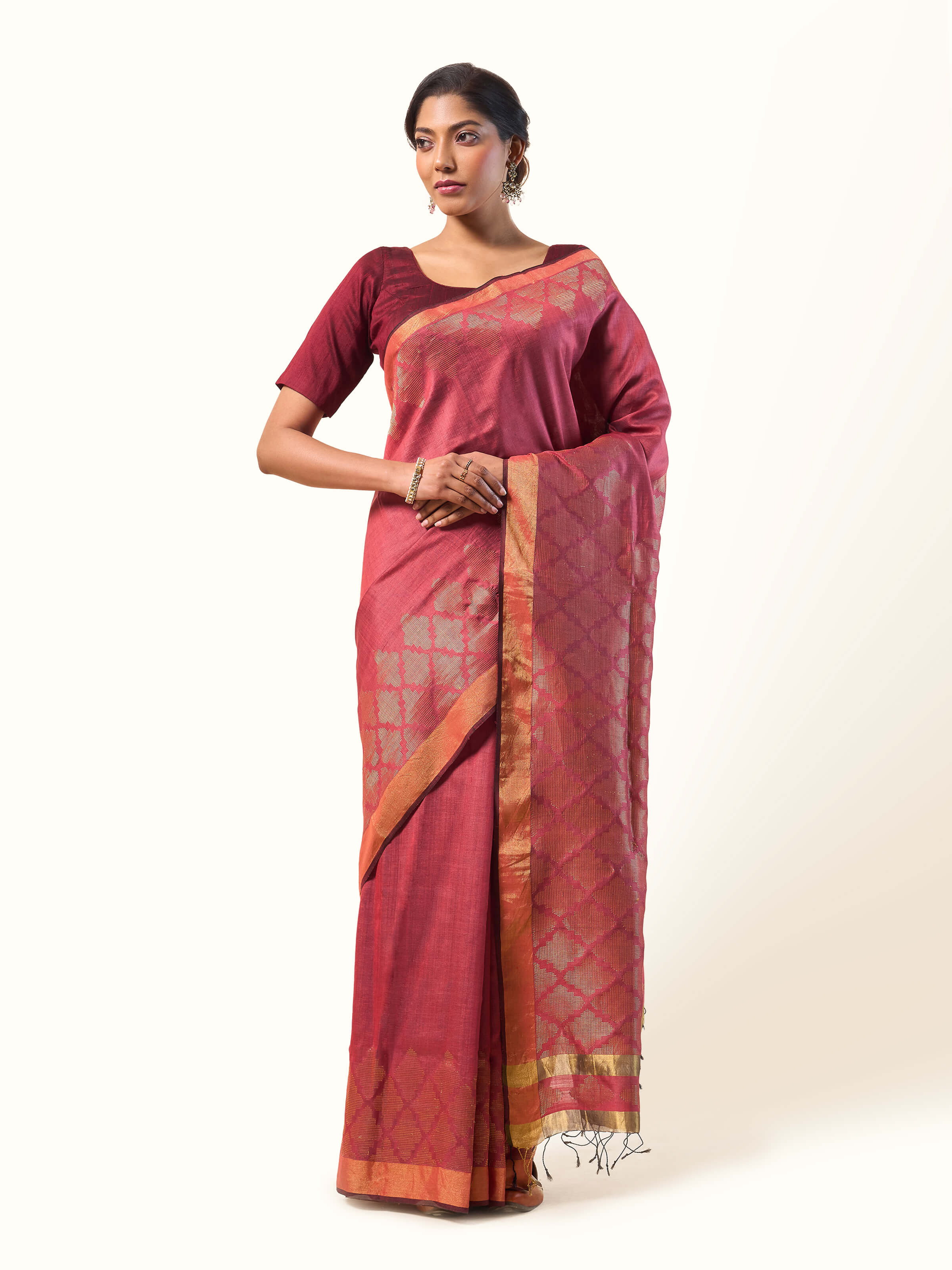 Front view of Maroon Eri Silk Extra-weft Saree featuring rich maroon eri silk fabric and delicate extra-weft design.