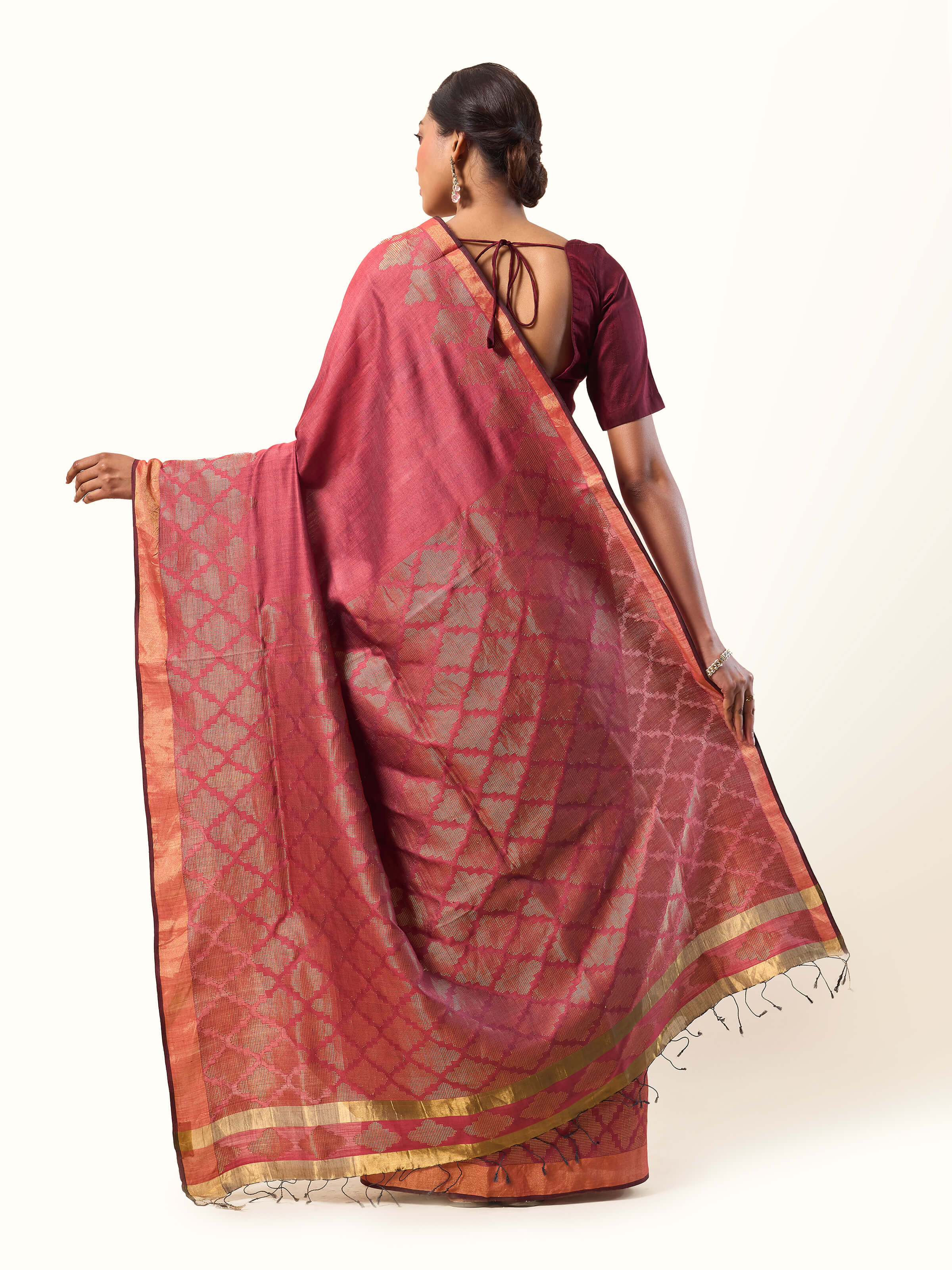 Back view of Maroon Eri Silk Extra-weft Saree displaying full saree length and weave artistry.